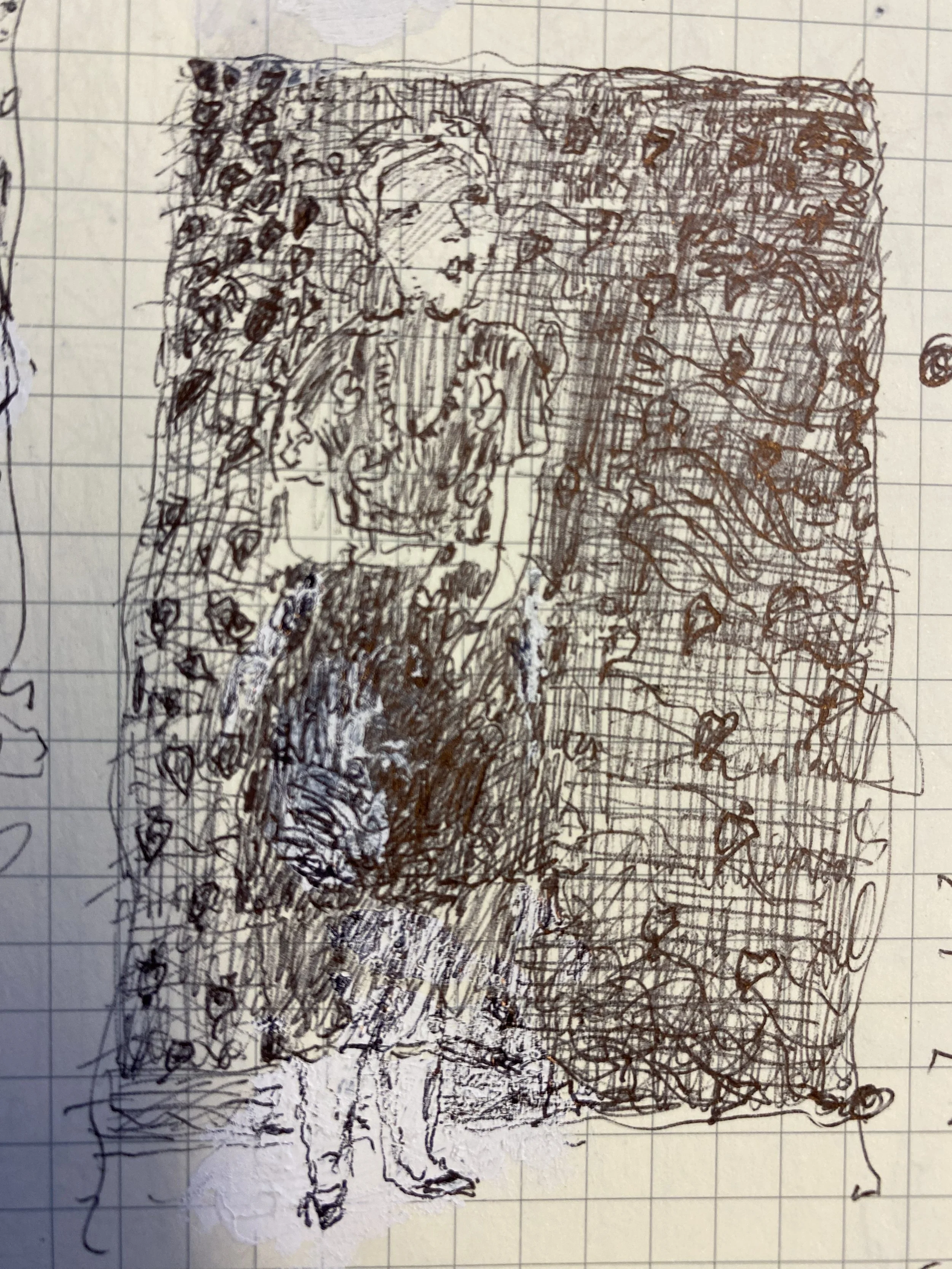 little girl against the hedge