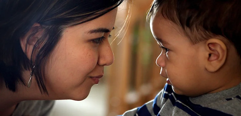 Jeannette & her son Axel, from a bilingual health education campaign for Chicago's HealthConnect One. Photo courtesy Charles Osgood.