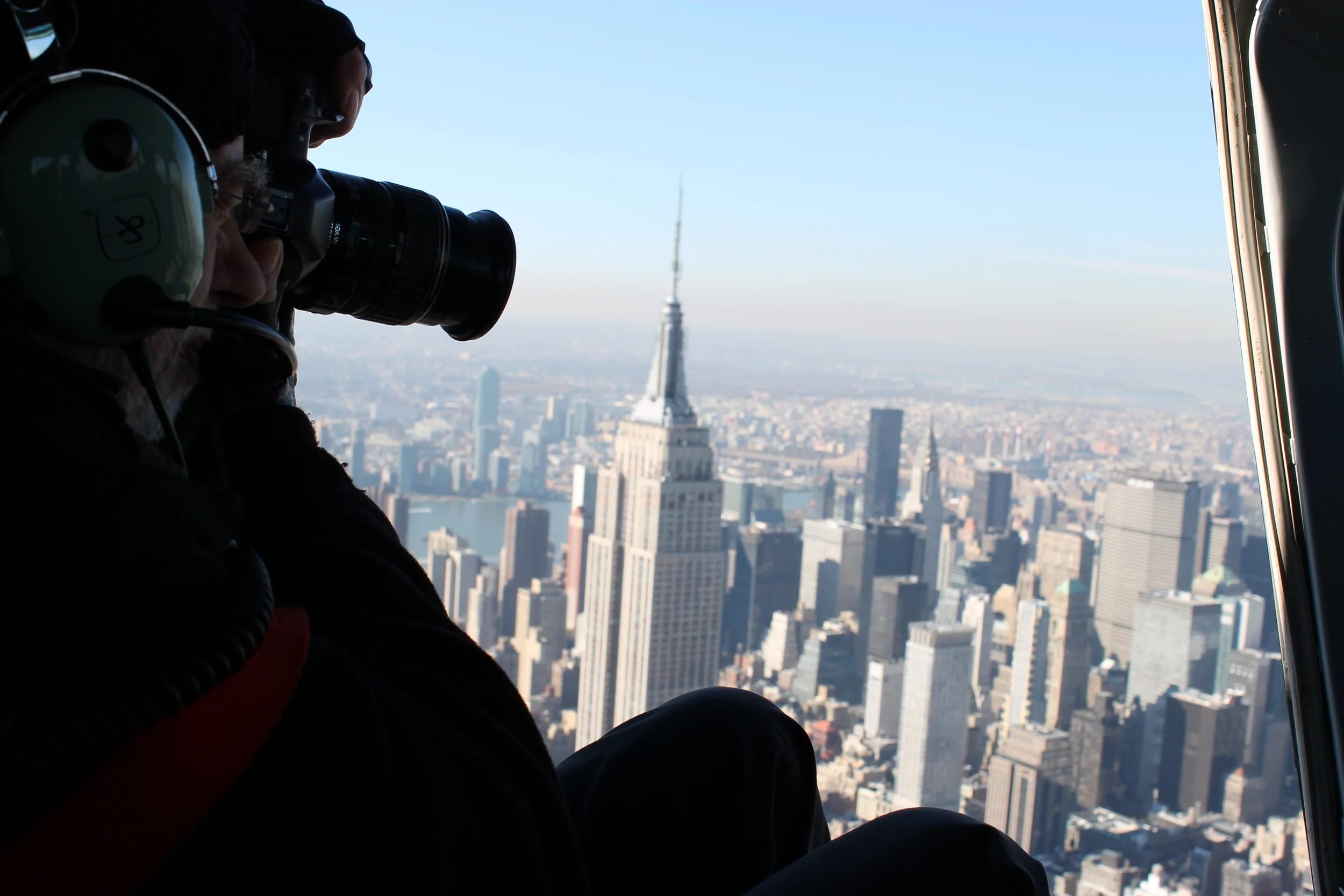 Salzmann photographing New York from a helicopter.