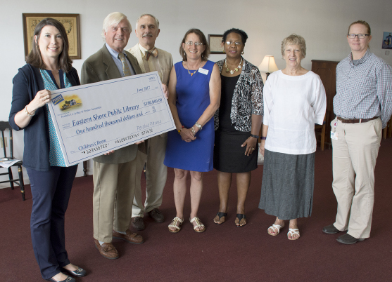 The Franklin P. and Arthur W. Perdue Foundation has committed $100,000 in funding to support the new Eastern Shore Public Library (ESPL) in Parksley, Va. From left to right are Kim Nechay, executive director of the Perdue Foundation, Fitz Godwin, president of the Eastern Shore Public Library Foundation, John Edmonds, chairman of the Library Foundation, Cara Burton, director of ESPL, Bel Holden, Perdue human resources manager in Accomac, Kitty Hall, chair of the library board of trustees, and Tamra Langford, Perdue business unit leader in Accomac.