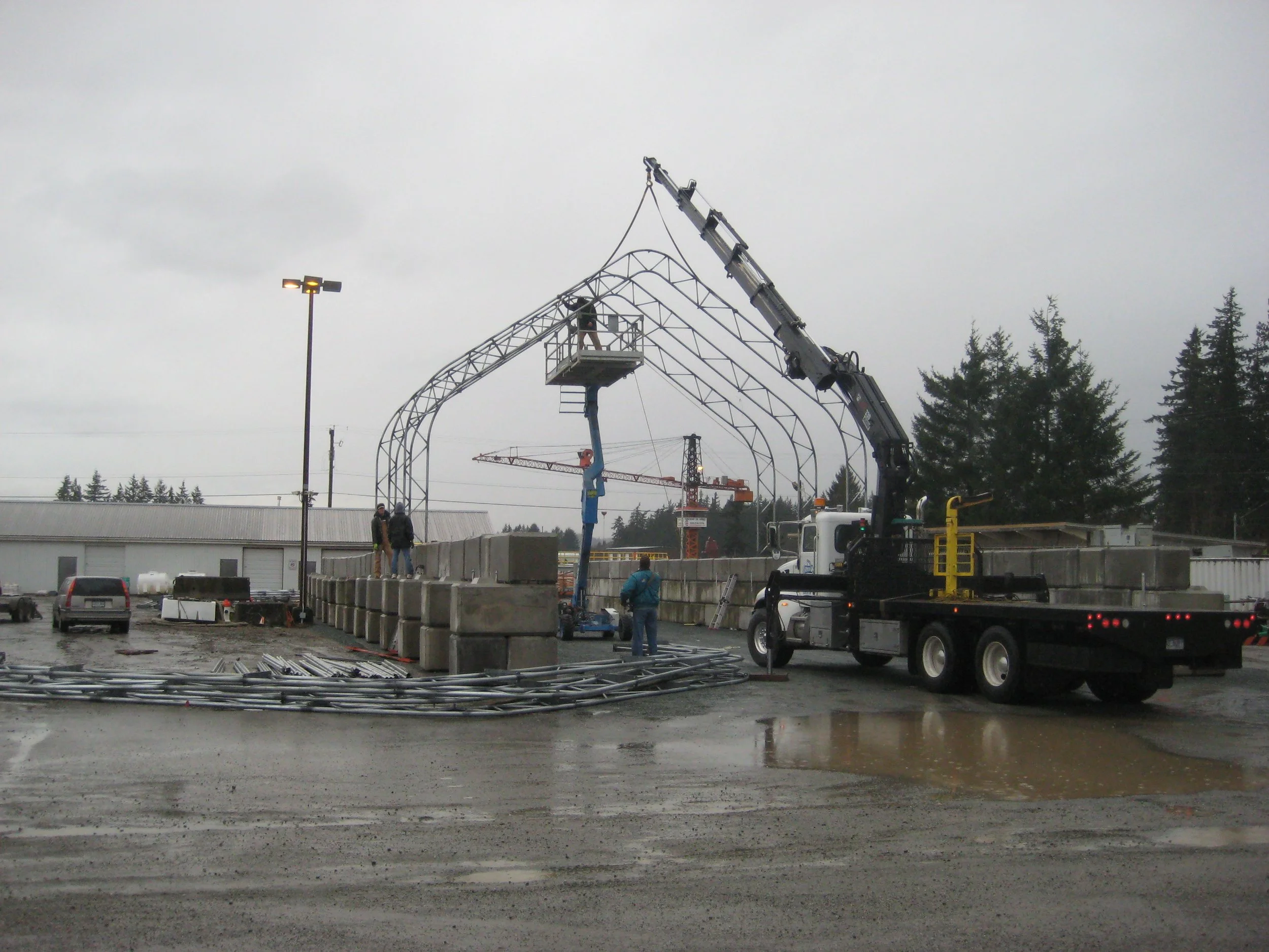 Tarp building construction by Exceptional Innovation