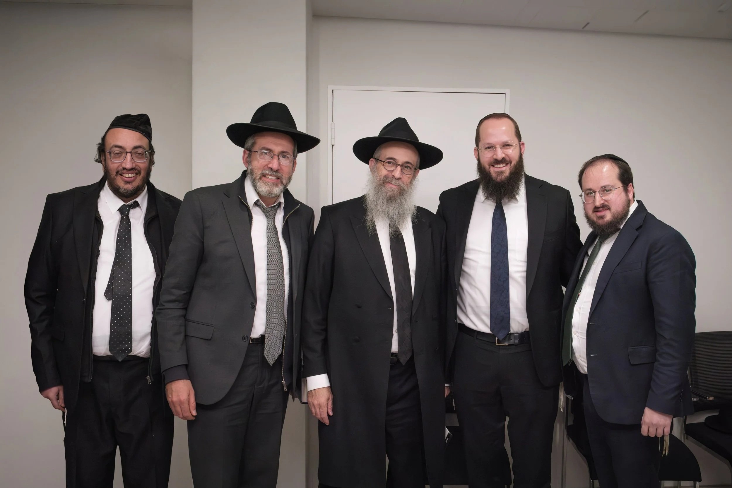 L-R: Dayan Yoel Smith, Dayan Dovid Baddiel, Dayan Gidon Fox, STAMP Director Rabbi Avraham Yechezkel Lessin and Beth Din Rabbinical Director Rabbi Shmuel Slasky