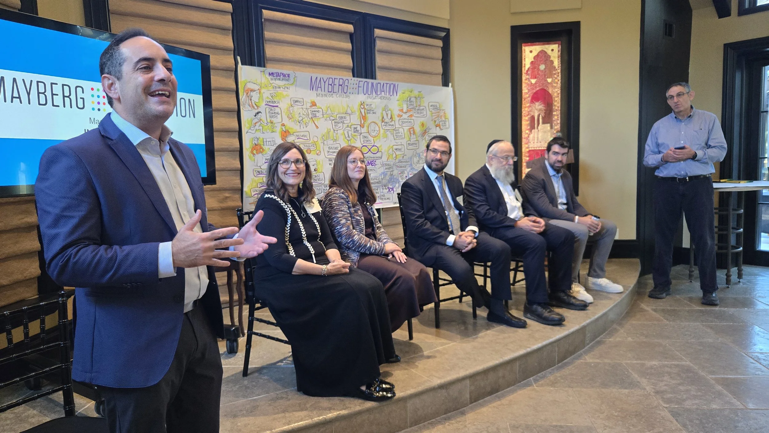 Jon Ackerman leads panel discussion.jpg