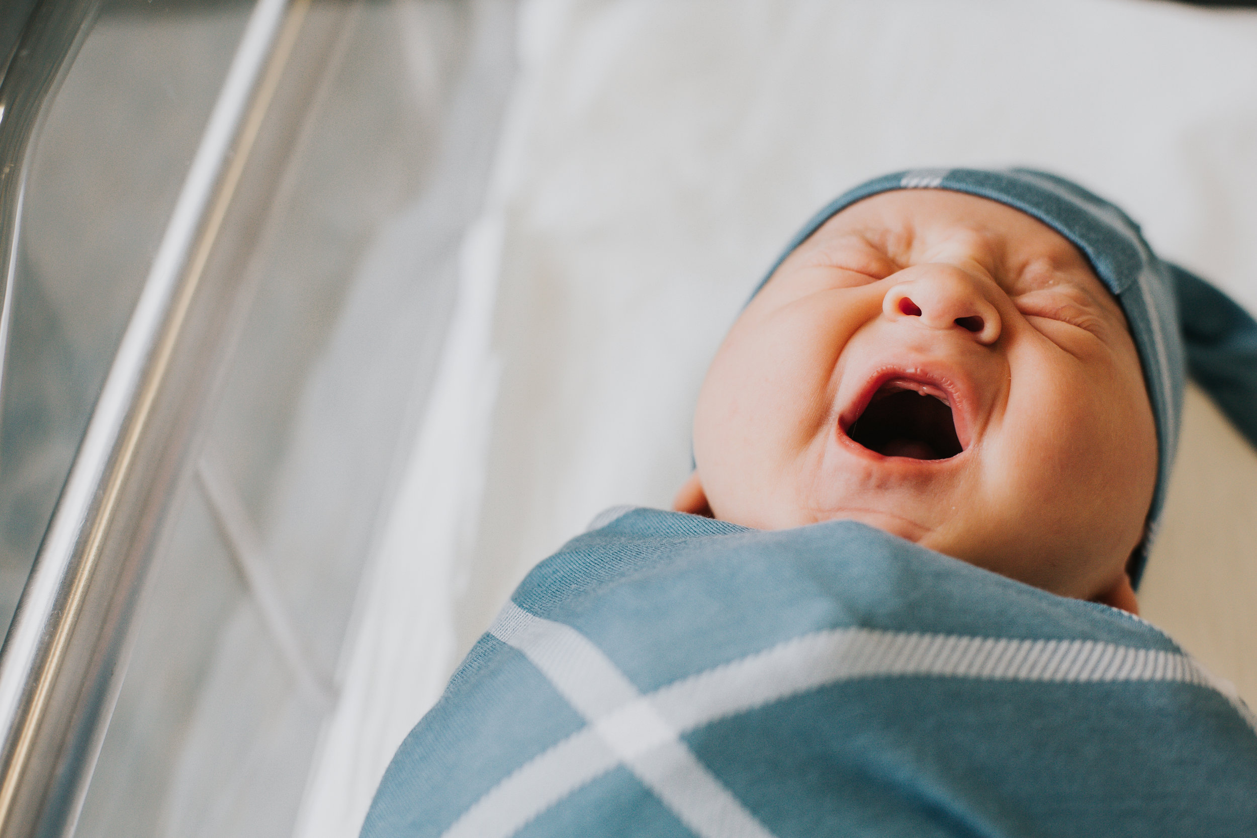 Newborn yawning at Thomas Hospital in Fairhope Alabama