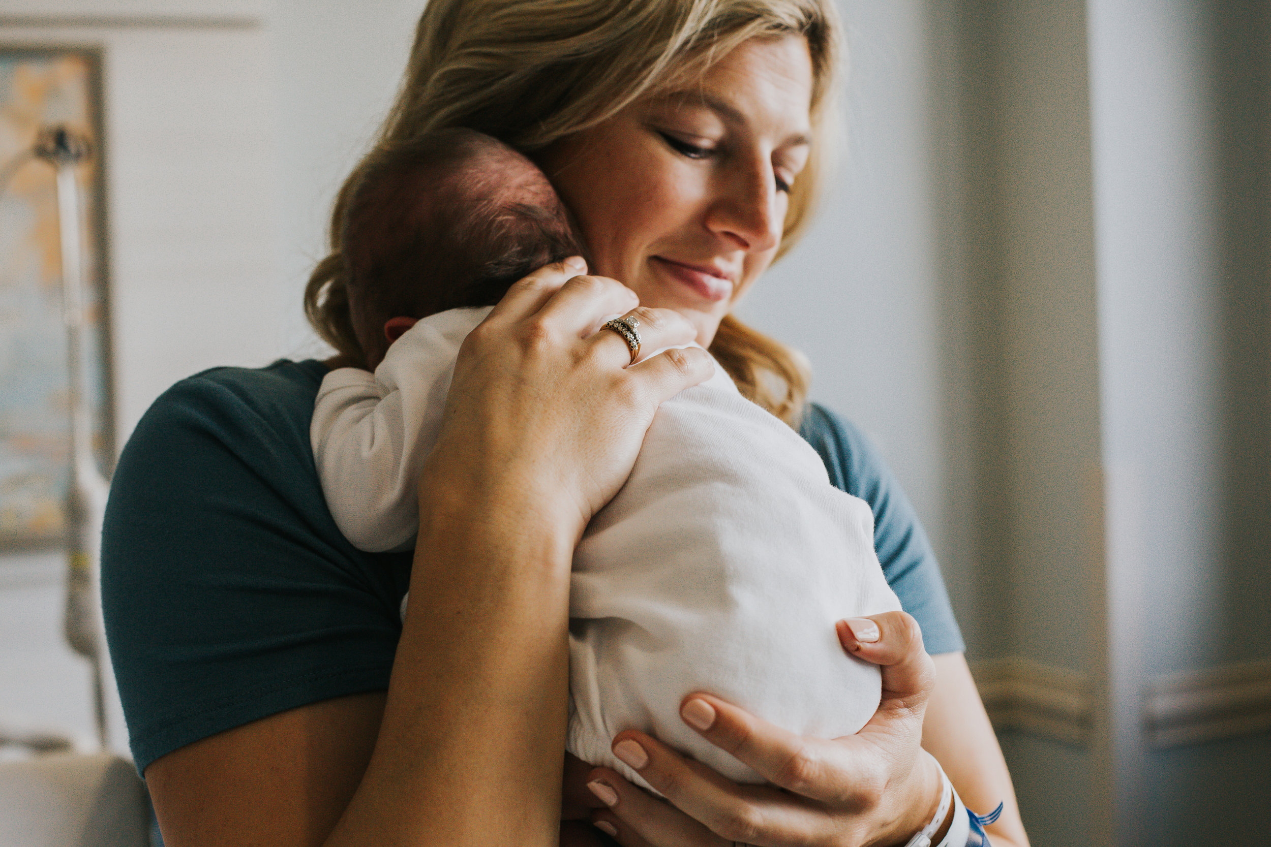 Mama holding newborn at Thomas Hospital in Fairhope Alabama