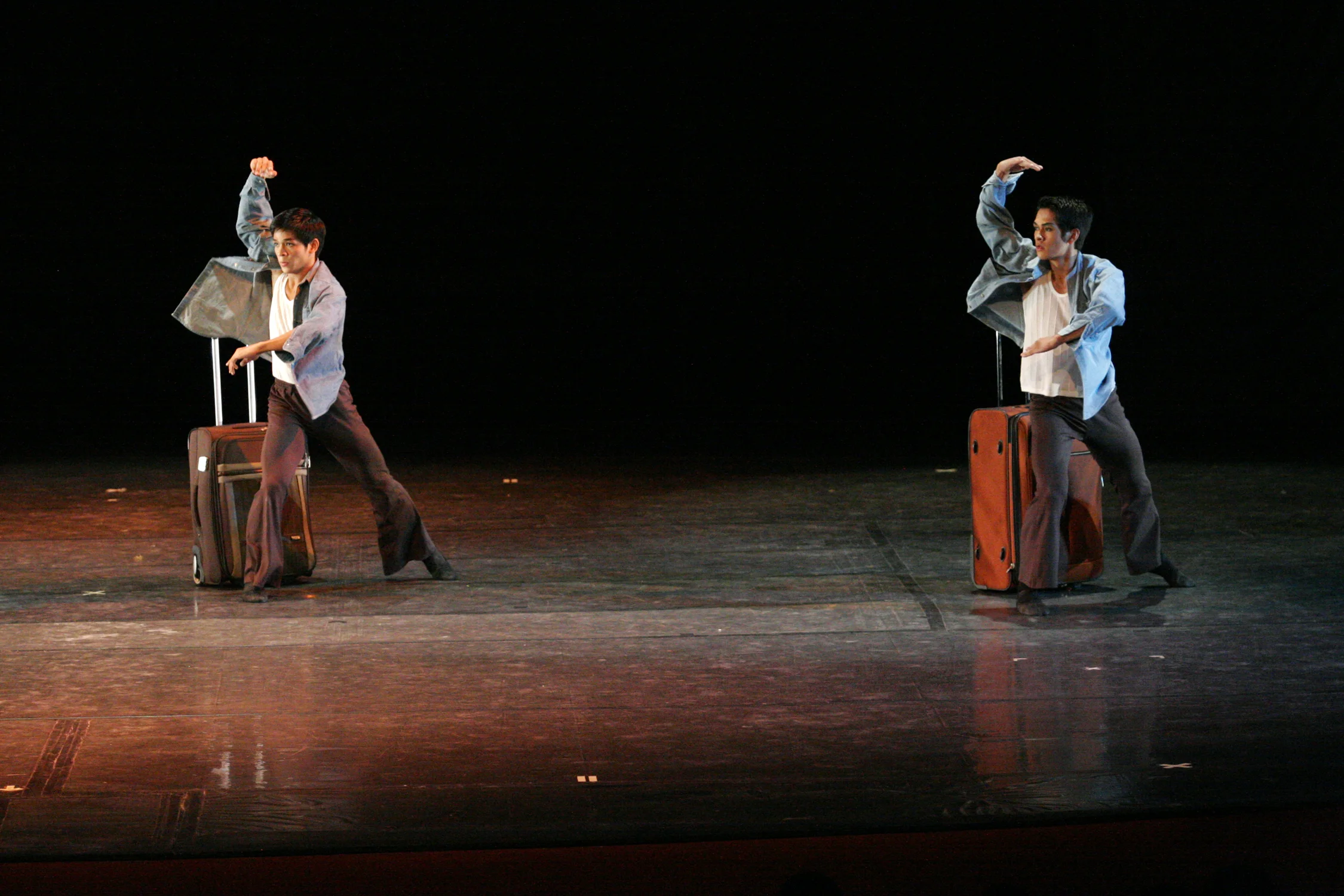 OFW portrays in dance the often sad journey of Filipino workers as they work away from family. Photo by Ocs Alvarez