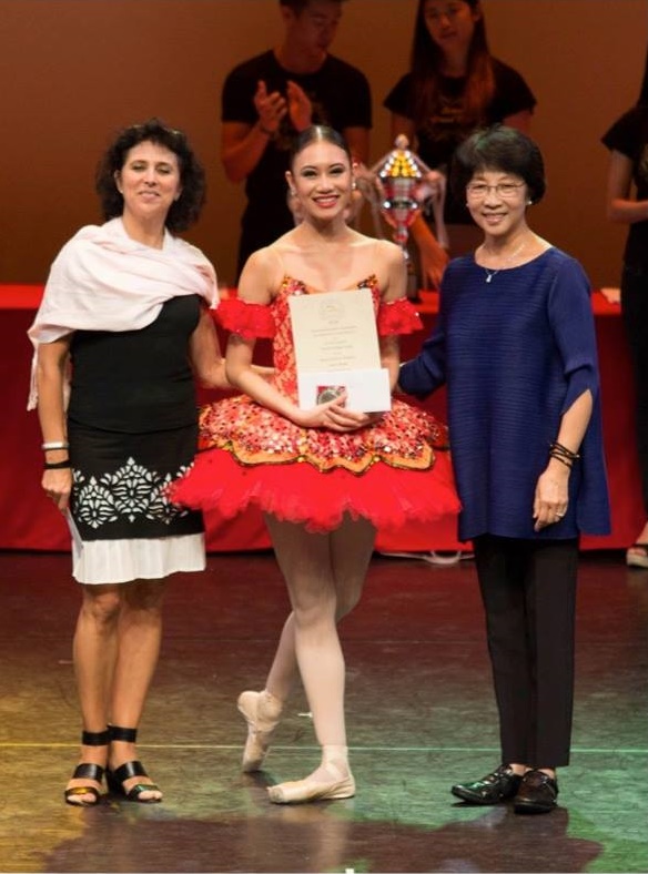 Accepting her award as silver medalist in the Senior Division of the Asian Grand Prix 2015 in Hong Kong. Photo courtesy of Asian Grand Prix