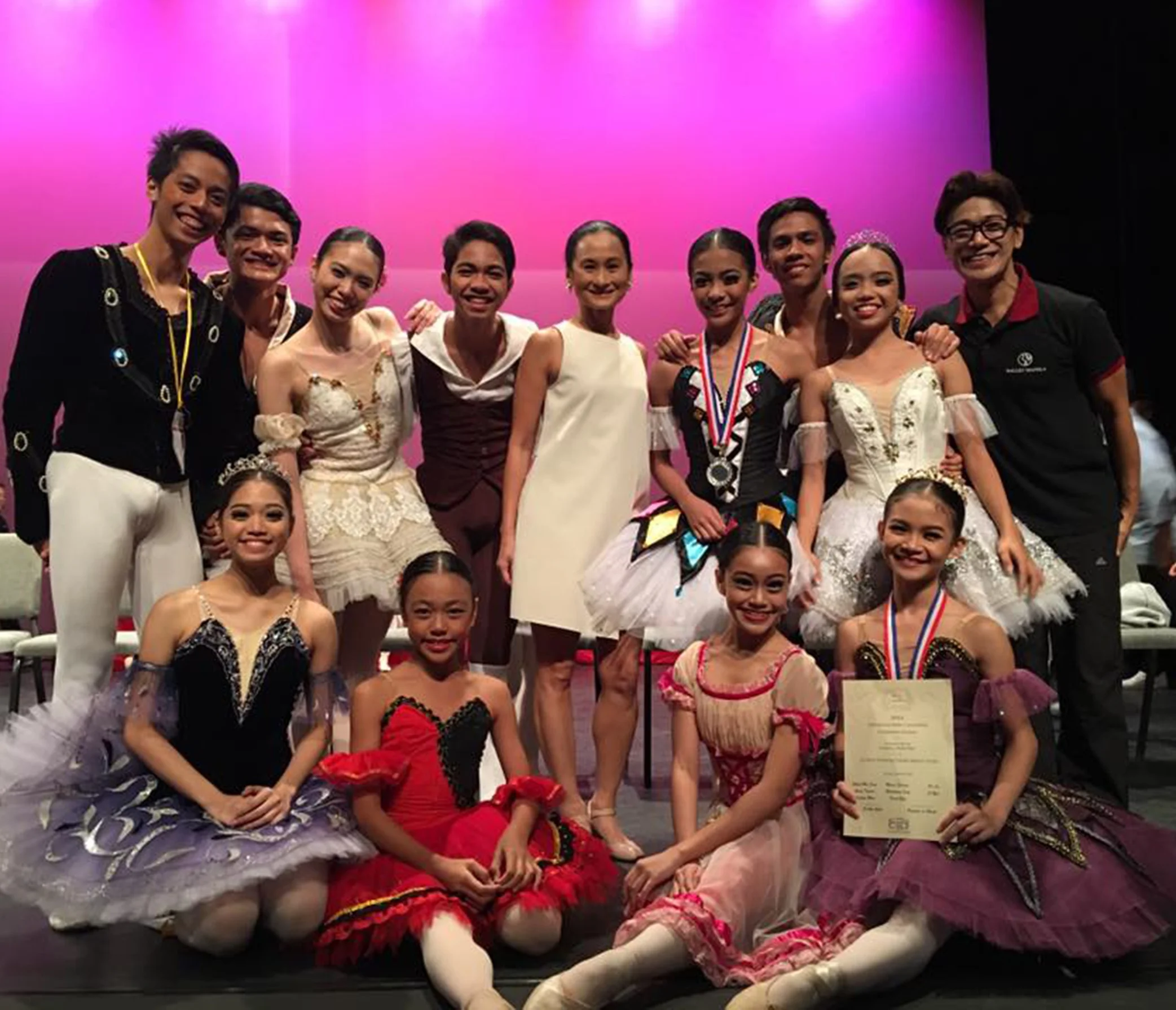 Shaira Comeros (front, rightmost) was named Most Promising Female Dancer Award atthe 2016 Asian Grand Prix. With her in the photo are 11 of the 18-member BM delegation who also reached the finals: (standing, from left) Rodney Catubay, Joshua Encisco, Danielle De Guzman, Alvin Dictado, artistic director Lisa Macuja-Elizalde, silver medalist Nicole Barroso, Raymond Salcedo, Lyssa Apilado, and co-artistic director Osias Barroso; (seated, from left) Ana Andes, Loraine Gaile Jarlega and Ashley Salonga.