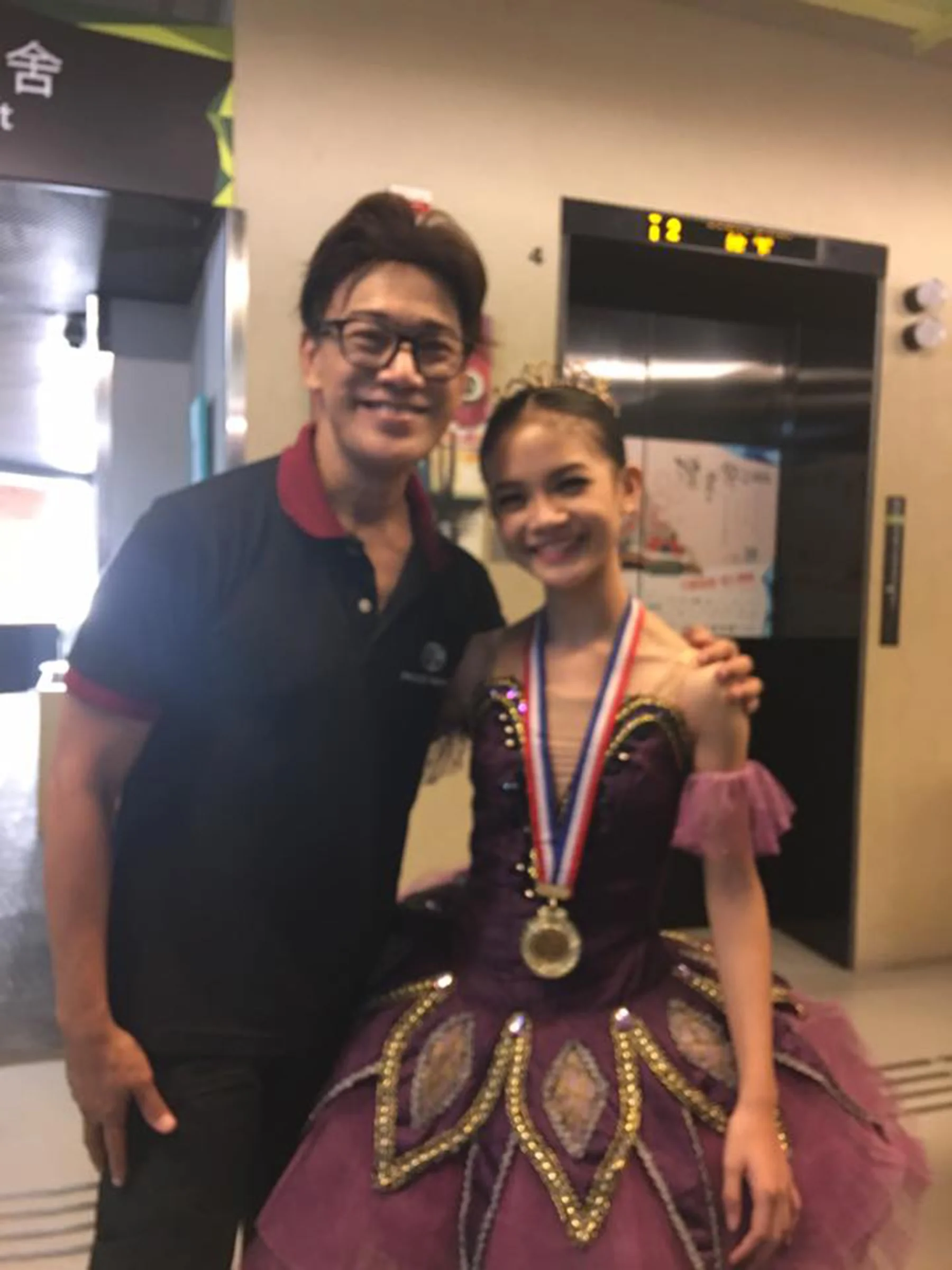 Celebrating with her mentor Osias Barroso outside the Y-Theater in Hong Kong, shortly after the AGP awarding rites. Photo from Osias Barroso's Facebook page