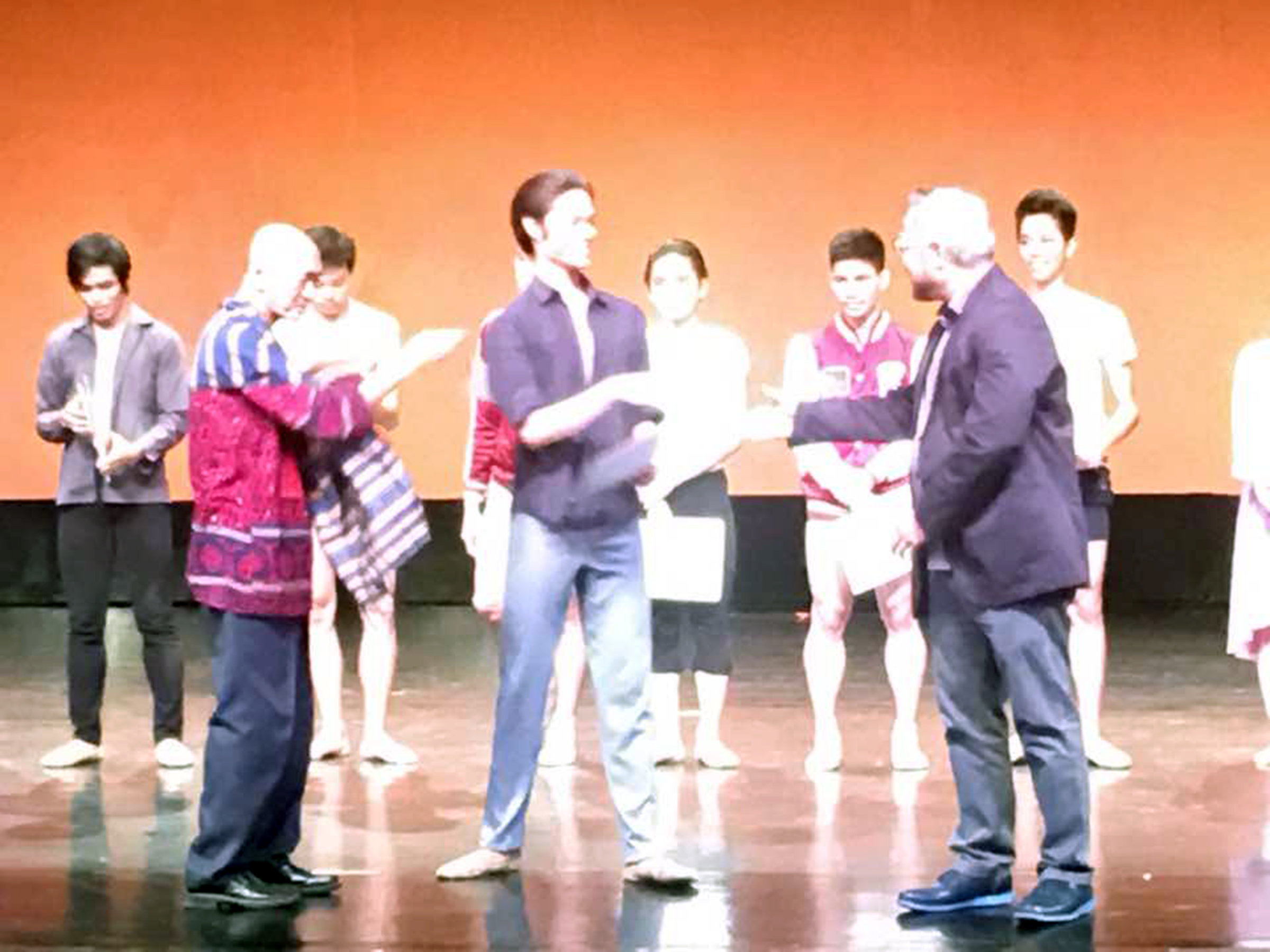 Godwin Merano (center) receives his finalist certificate in the CCP Ballet Competition from Cultural Center of the Philippines VP and artistic director Chris Millado (right) and dance mentor and critic Basilio Esteban Villaruz. Photo by Osias Barroso