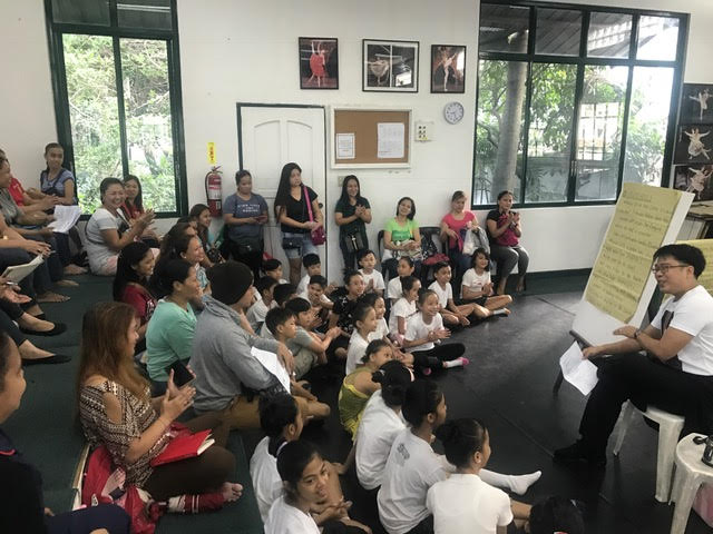 Ballet Manila rehearsal master Jonathan Janolo leads an orientation meeting with the new PBF scholars and their parents.