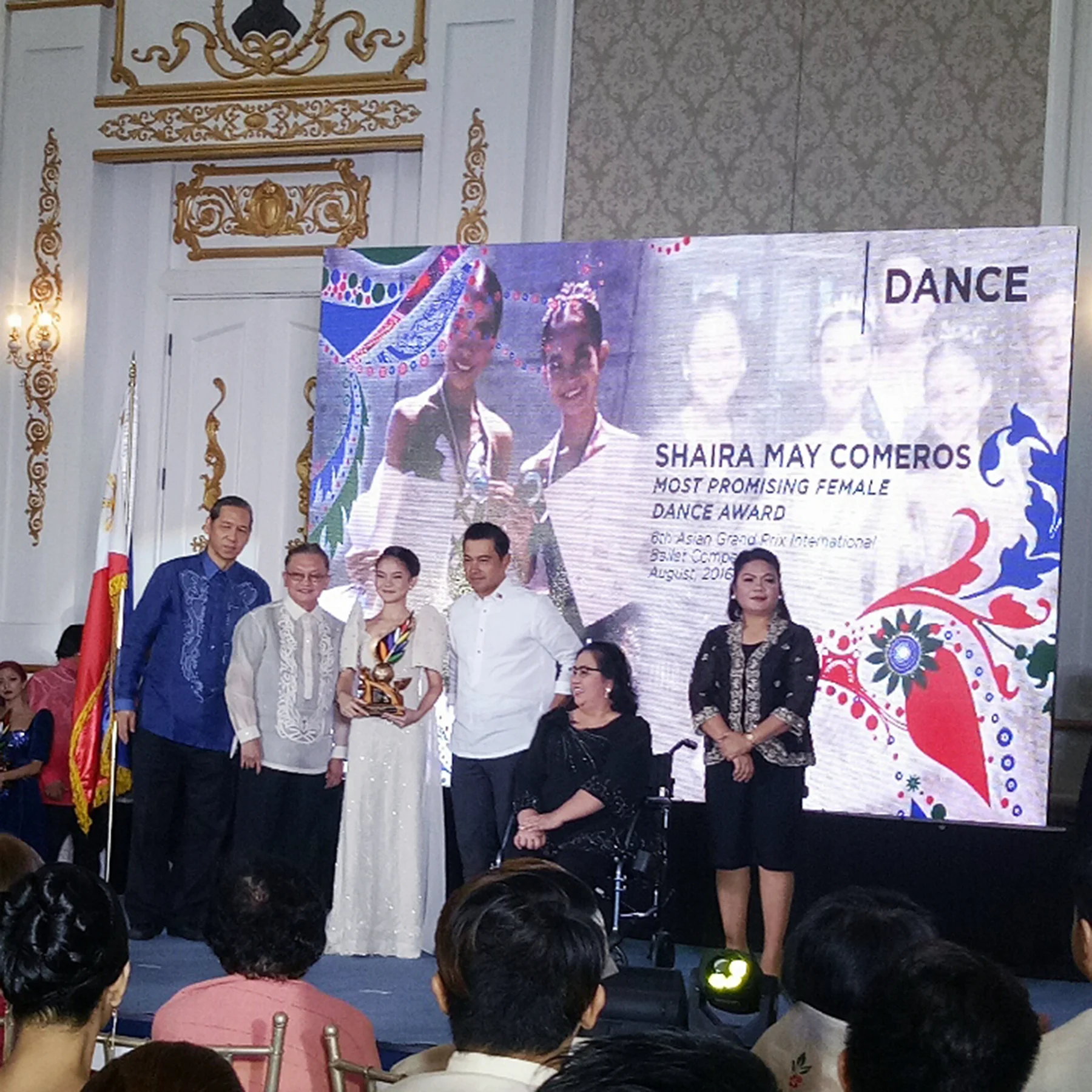 Shaira Comeros receives her Ani ng Dangal award at a program hosted by the National Commission for Culture and the Arts in Intramuros.
