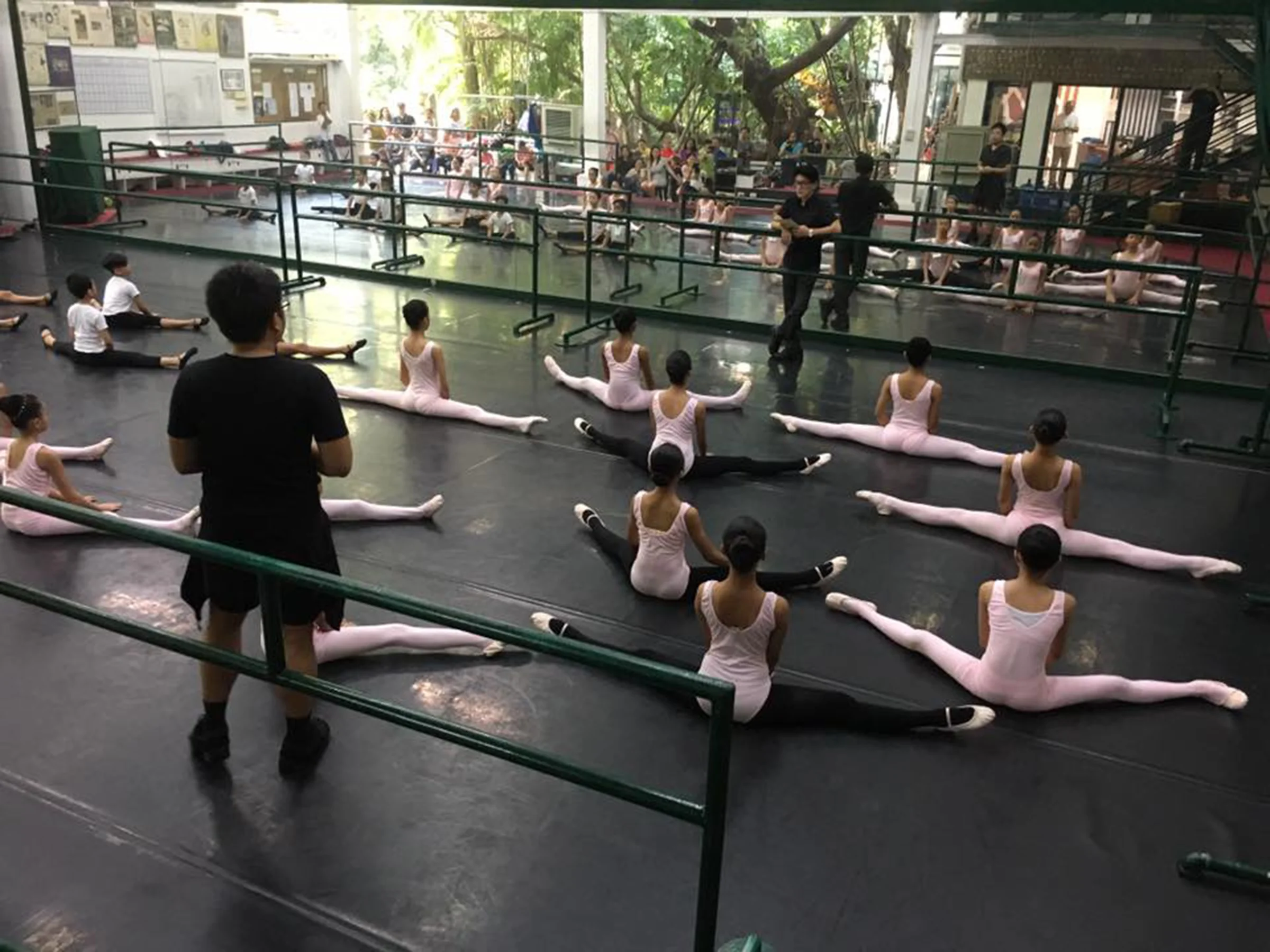 Ballet Manila co-artistic director Osias Barroso (facing camera) and Jonathan Janolo conduct an evaluation class of potential Project Ballet Futures scholars for this year’s Summer Intensive.