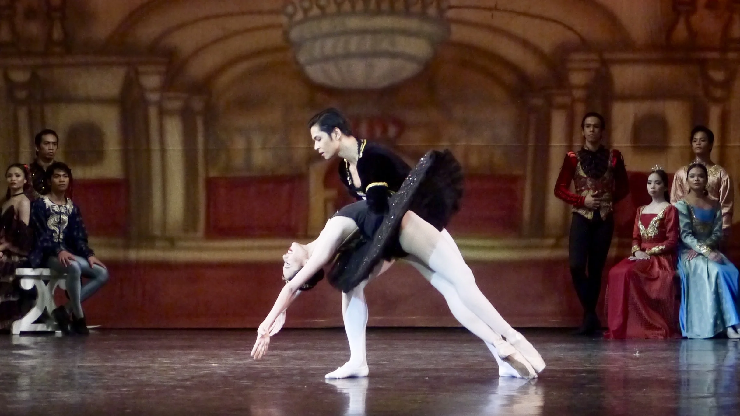 Abigail Oliveiro as Odile, the Black Swan, and Mark Sumaylo as Prince Siegfried. Photo by Giselle P. Kasilag