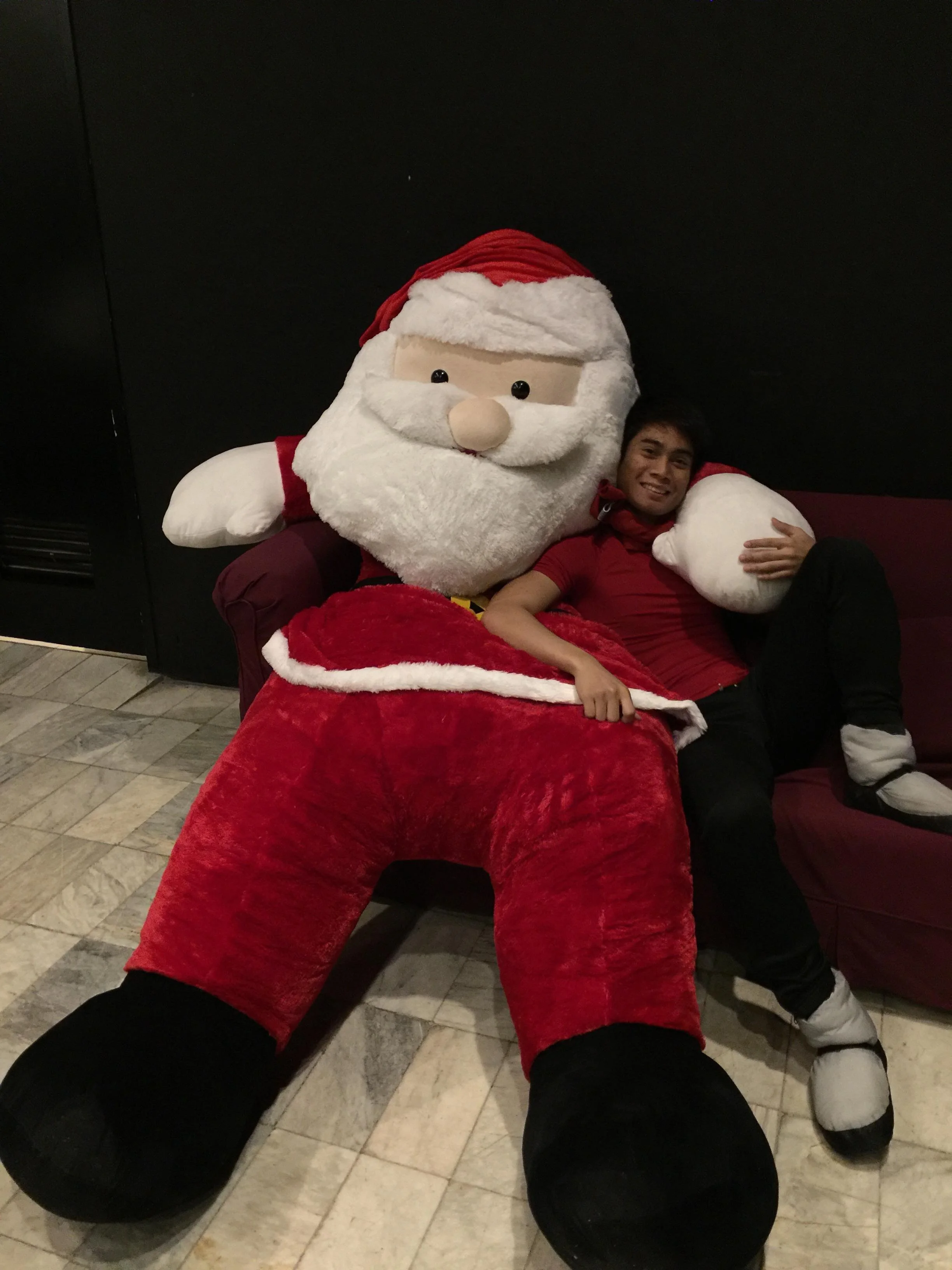 John De Dios spends time with Santa at the backstage of Aliw Theater.