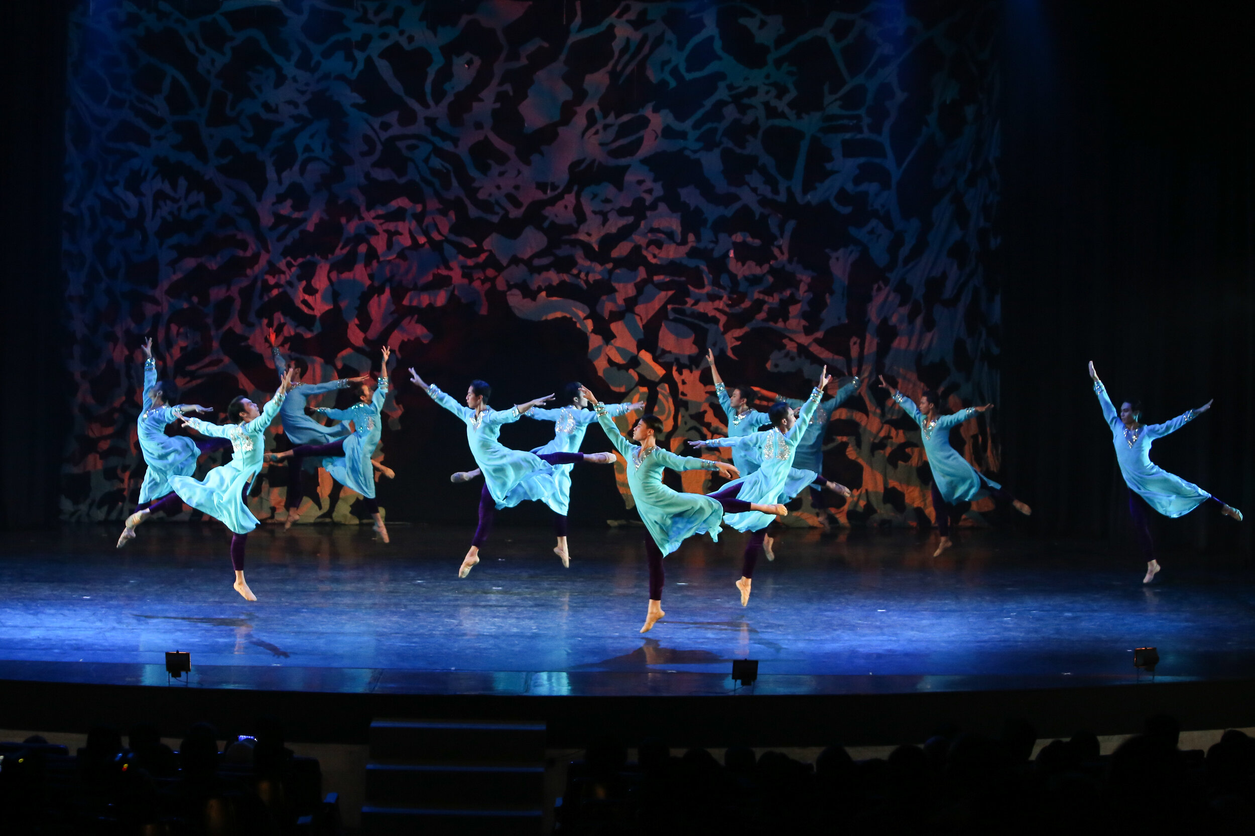    The Ballet Manila boys stand out in their flowy aqua tunics as they execute a flurry of movements in Bam Damian’s all-male choreography  Aramica , performed in Deux, 2019. Photo by Ian Santos   