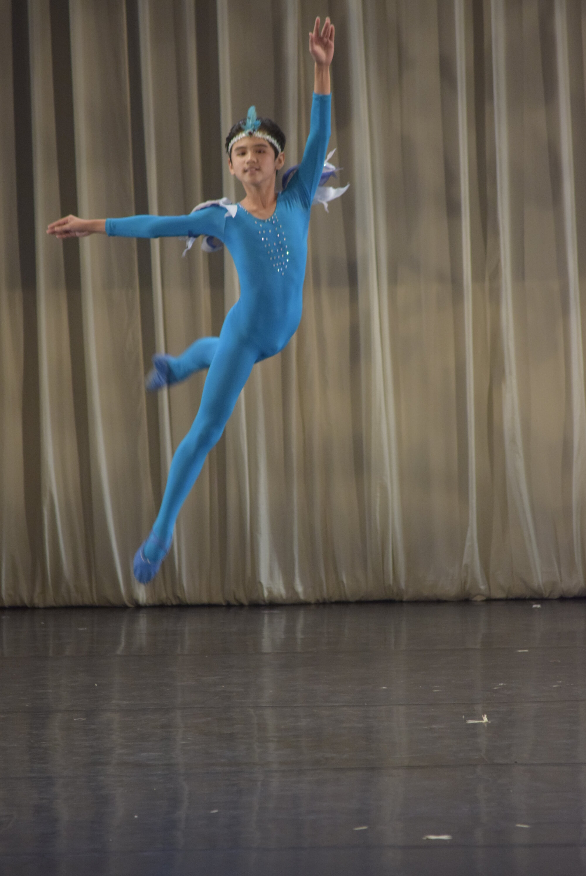    Juan Angelo De Leon achieves lift-off in the  Blue Bird Variation  from  The Sleeping Beauty  – in a blue costume, but of course! After performing the variation in  Tuloy ang Sayaw-an , a ballet fundraiser in July 2019 (above), Angelo danced it as
