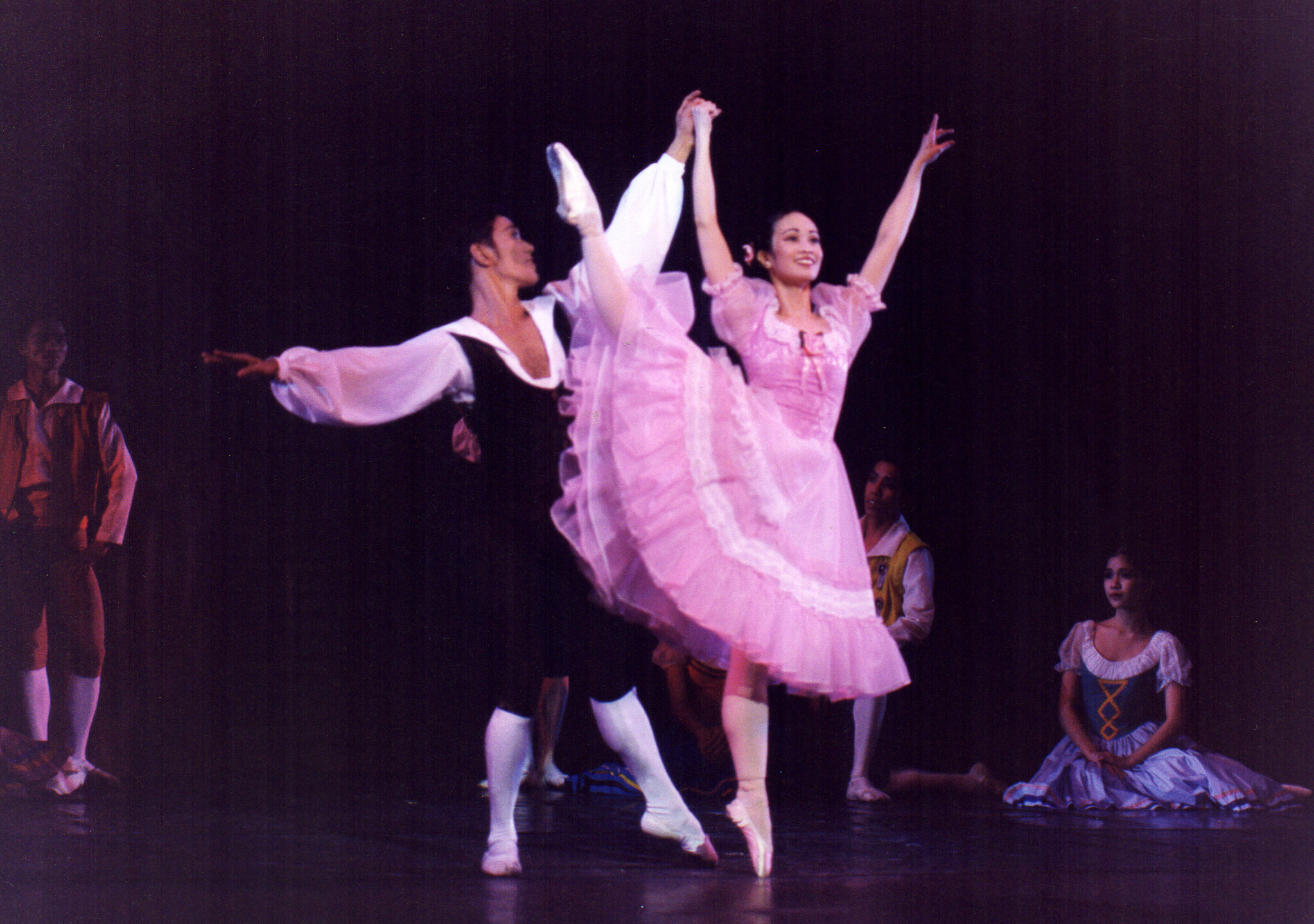    In a tutu adorned with pink ruffles and white lace, Lise (Pamela Asprer) steals some time with her beloved Colas (Osias Barroso) in  La Fille Mal Gardee  (2000). In the story, Lise is guarded well by her strict mother, Widow Simone, who wants to m