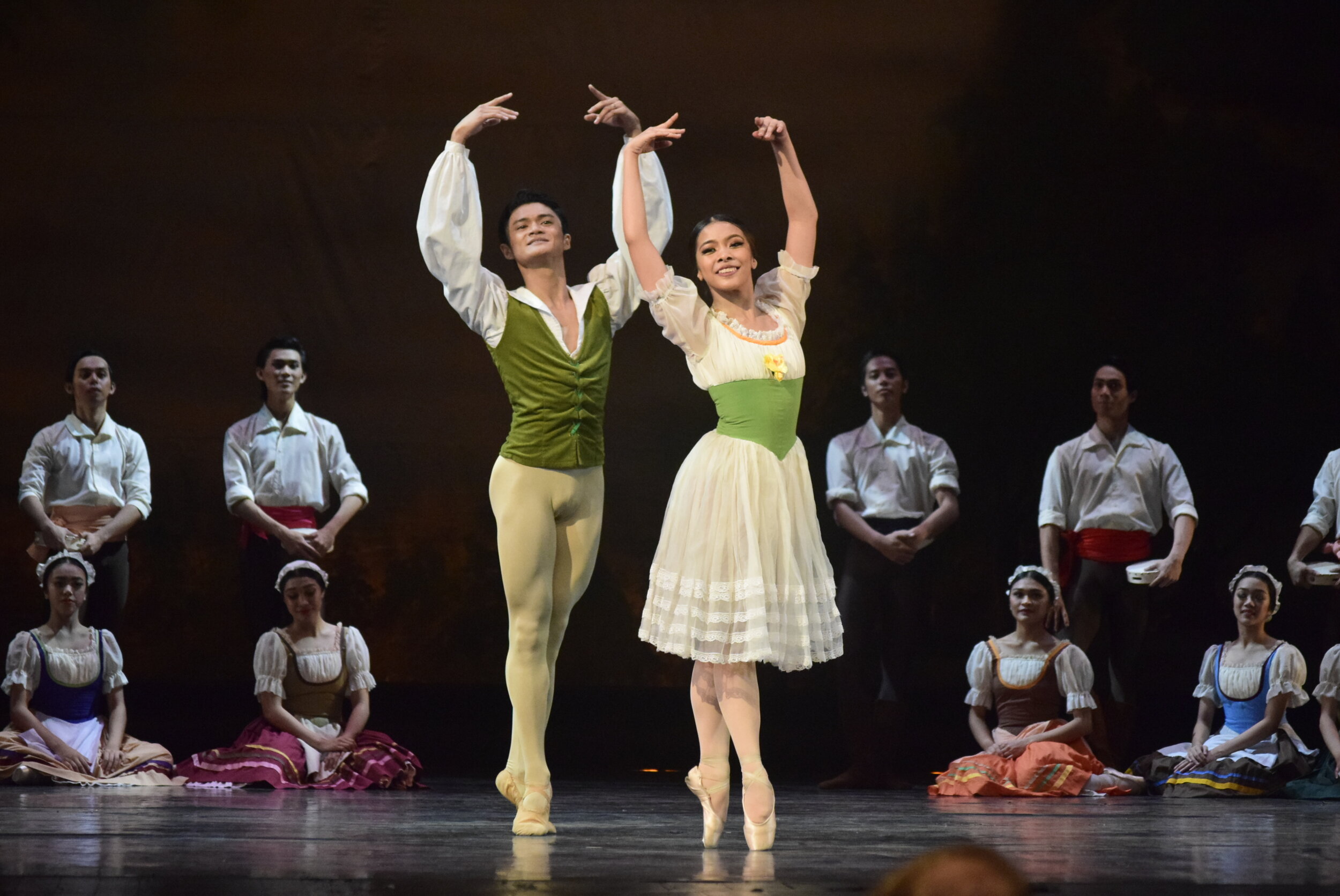    Light and fast on their feet, Joshua Enciso and Nicole Barroso are well-matched in olive green and cream for the  Peasant Pas de Deux  in  Giselle , staged at the Cultural Center of the Philippines in 2019. Photo by Erickson Dela Cruz   