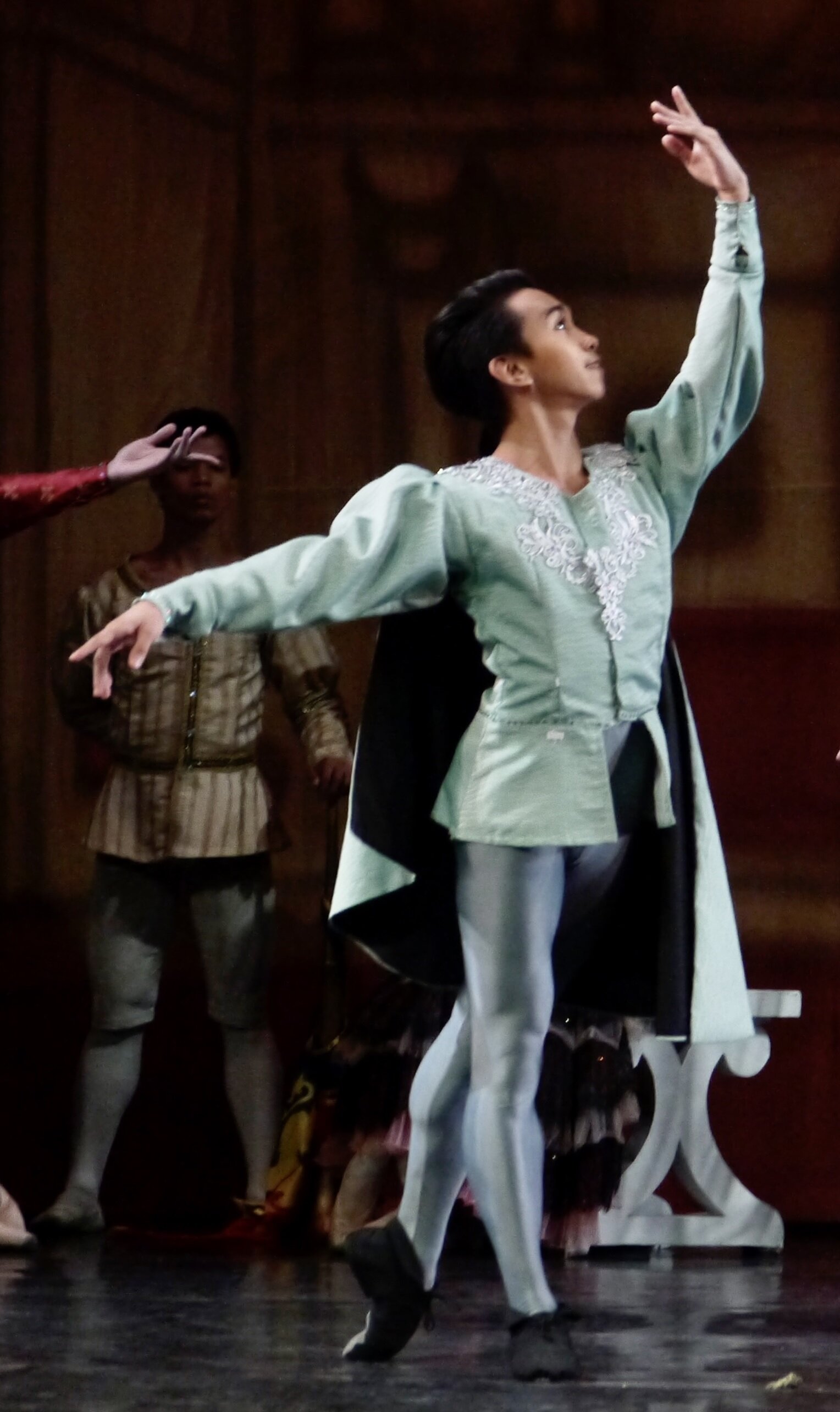    As a guest in Prince Siegfried’s birthday ball in  Swan Lake  (2017), the character of Eduardson Evangelio opts for subdued hues of mint green and gray. Photo by Giselle P. Kasilag   