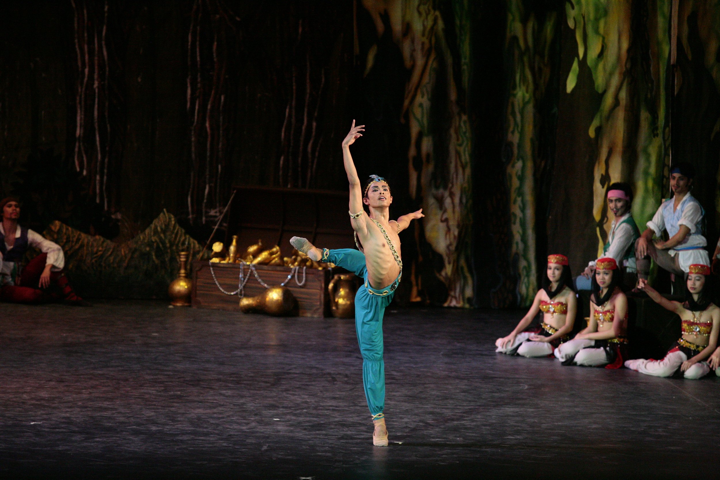    The loyal slave Ali (Elpidio Magat) is clad in harem pants in teal blue for his solo variation in  Le Corsaire  (2010). The Ali Variation is one of the most popular in ballet and often performed in competitions. Photo by Ocs Alvarez   