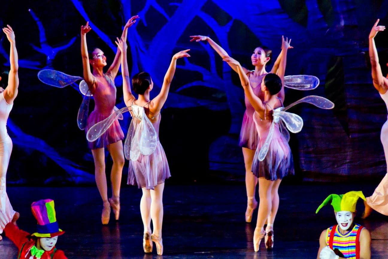    Enchantment is in the air as fairies flit about on stage, mixing with circus acts.   