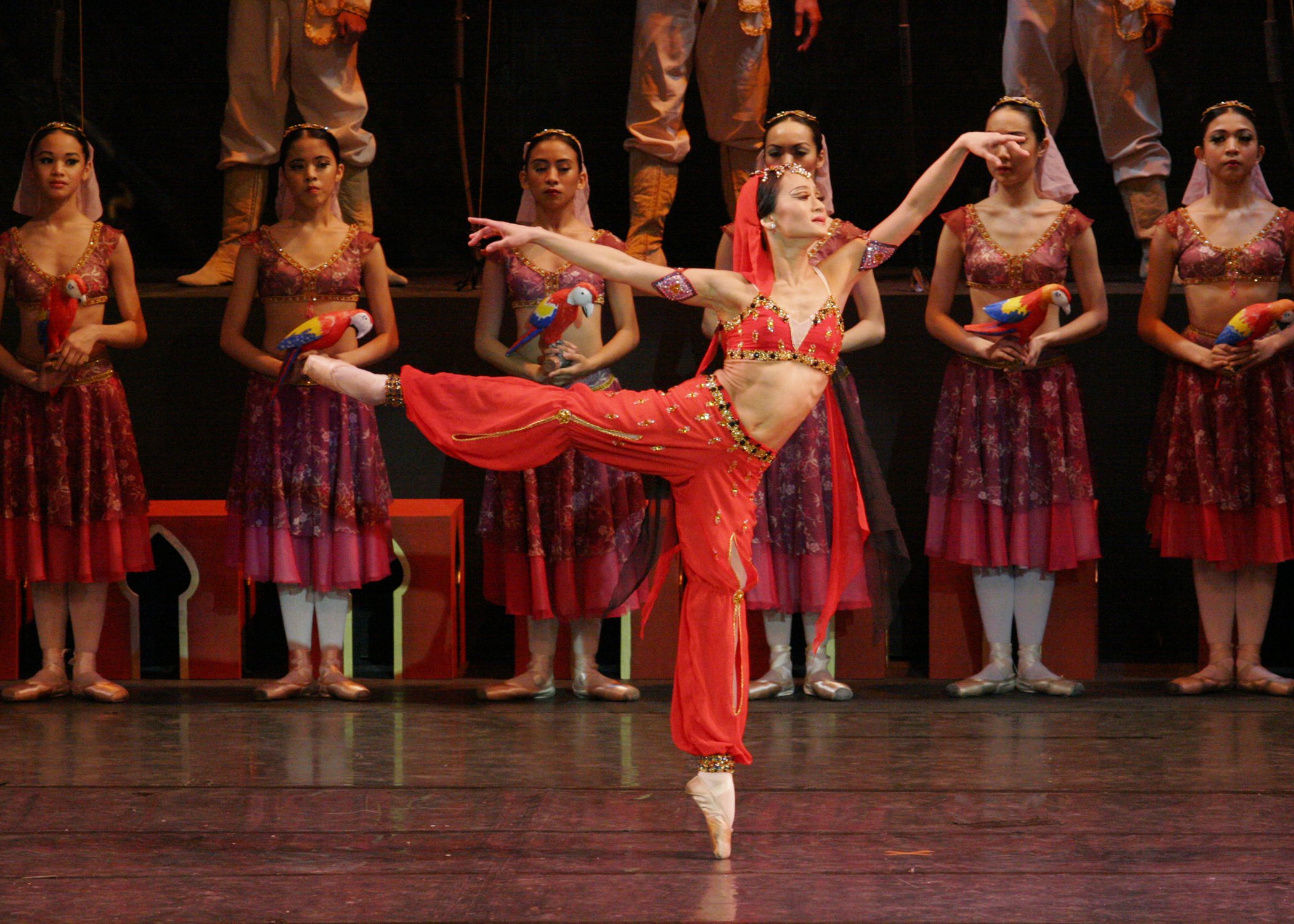    Nikiya (Lisa Macuja-Elizalde), stunning in her red finery, falls for Solor in  La Bayadere  (2004) but it’s a forbidden love that causes her untold heartache. As she dances at the betrothal ceremony of Solor and Gamzatti, the girls performing the 