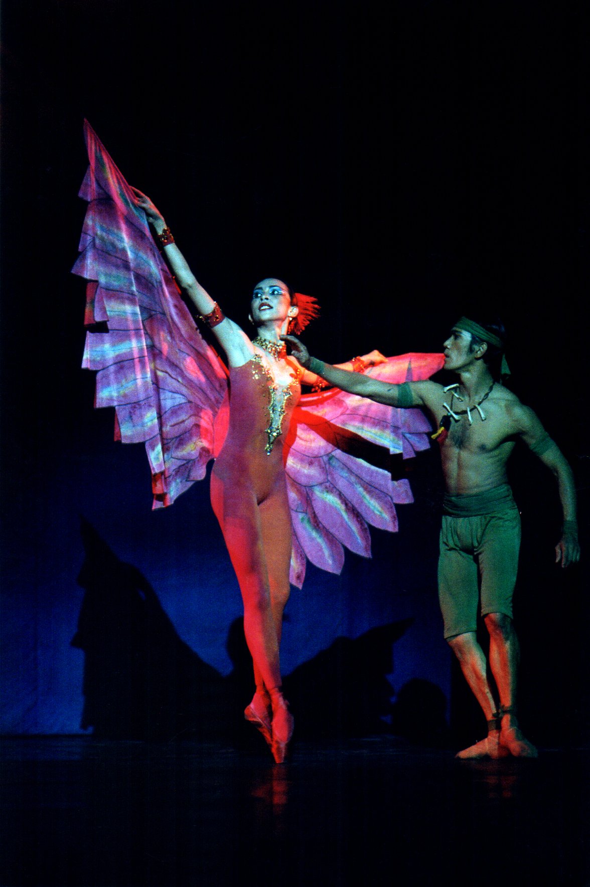    True to her titular character in Jean Paul Comelin’s  Firebird  (2000), Aileen Gallinera makes her presence felt to Osias Barroso in a costume channeling flames – a combination of blazing red and splashy orange. Photo by Ocs Alvarez   
