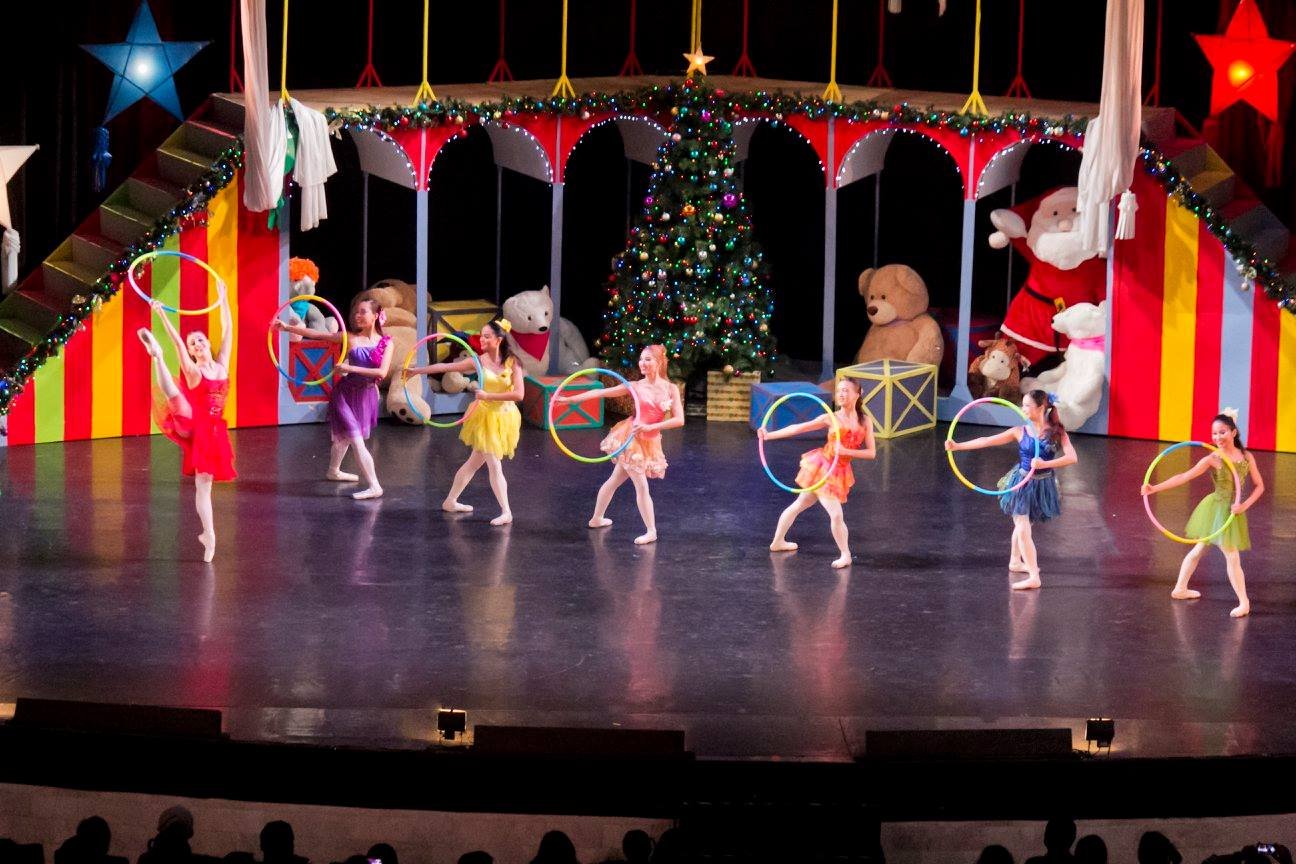    It’s a hoopla, quite literally, as these ballerinas led by Katherine Barkman (leftmost) handle neon-colored hoops as they dance to the merry strains of  Paskong Darating.&nbsp;  