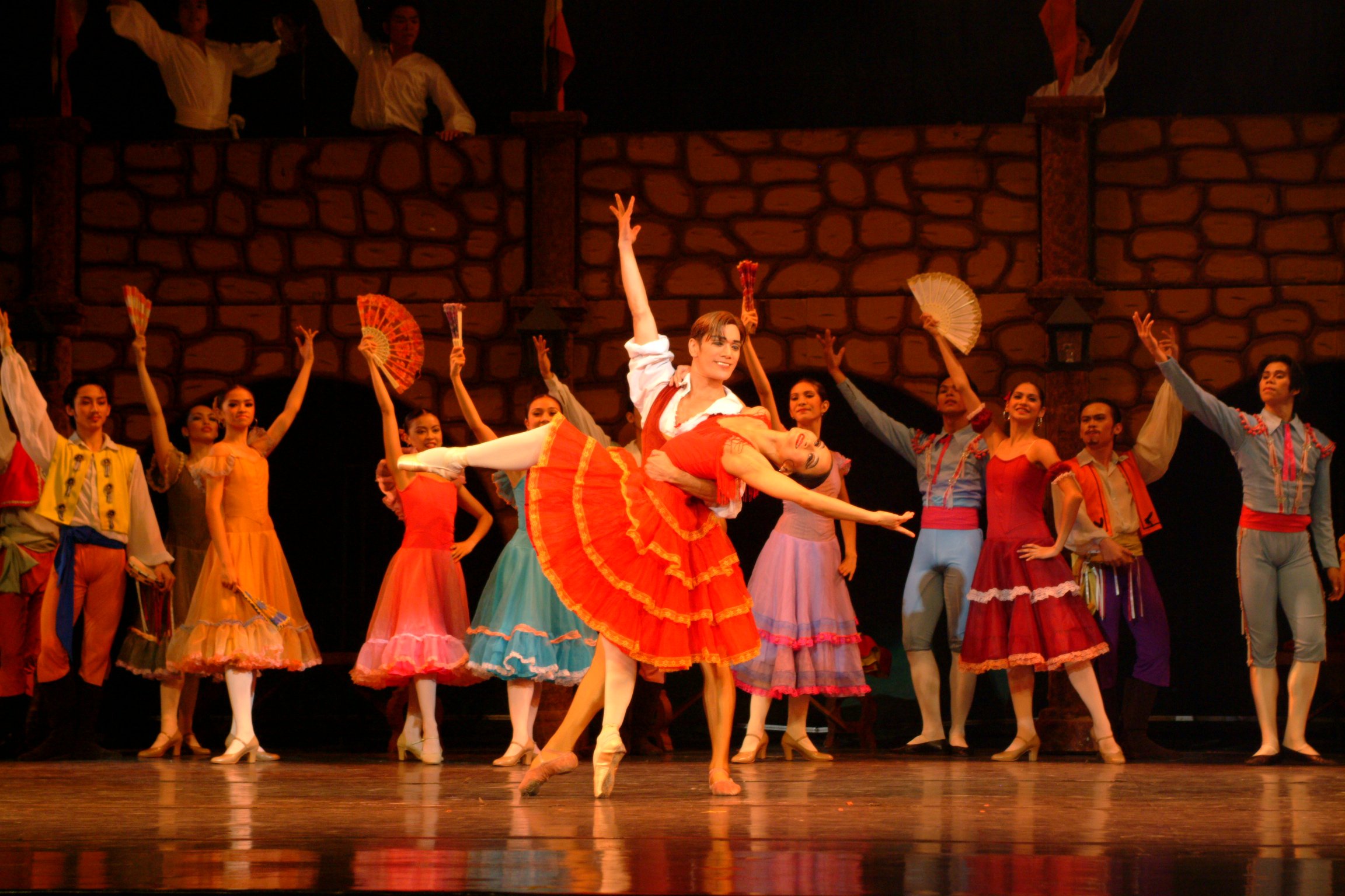    Dancing with Osias Barroso in one of Ballet Manila’s productions of  Don Quixote , 2004. “Kitri is a girl who epitomizes the French phrase ‘joie de vivre.’ She is in love with life and with Basilio, a poor barber.  Don Quixote &nbsp;is a fast brav