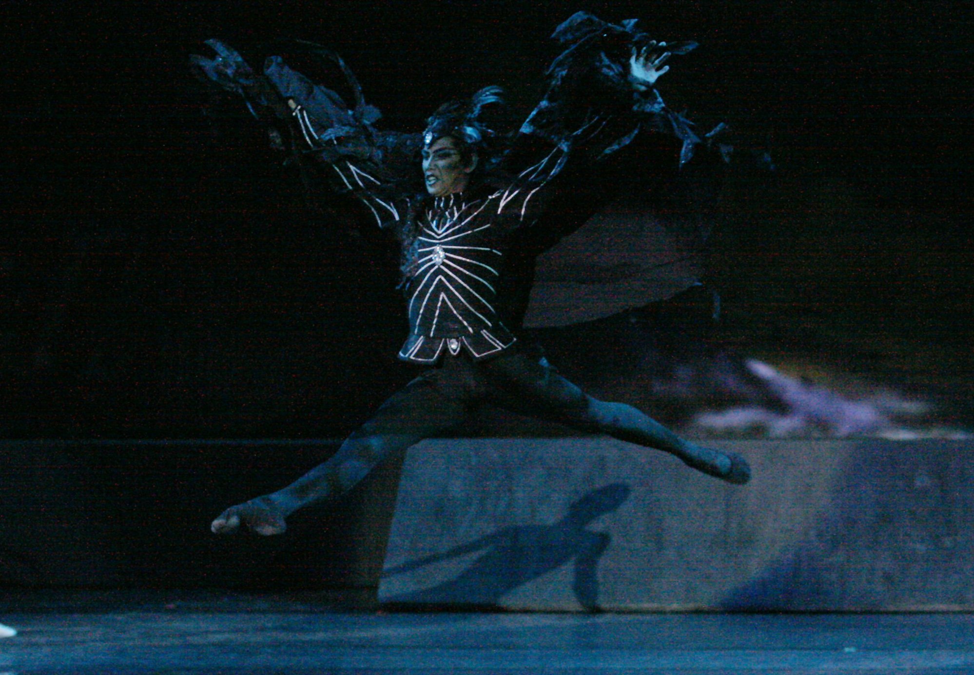    Looming like a predator, the sorcerer Von Rothbart (Nazer Salgado) looks even more menacing in a black outfit topped off by a cloak that reminds one of a vulture, the ultimate bird of prey. Salgado played the villain in the ballet classic  Swan La