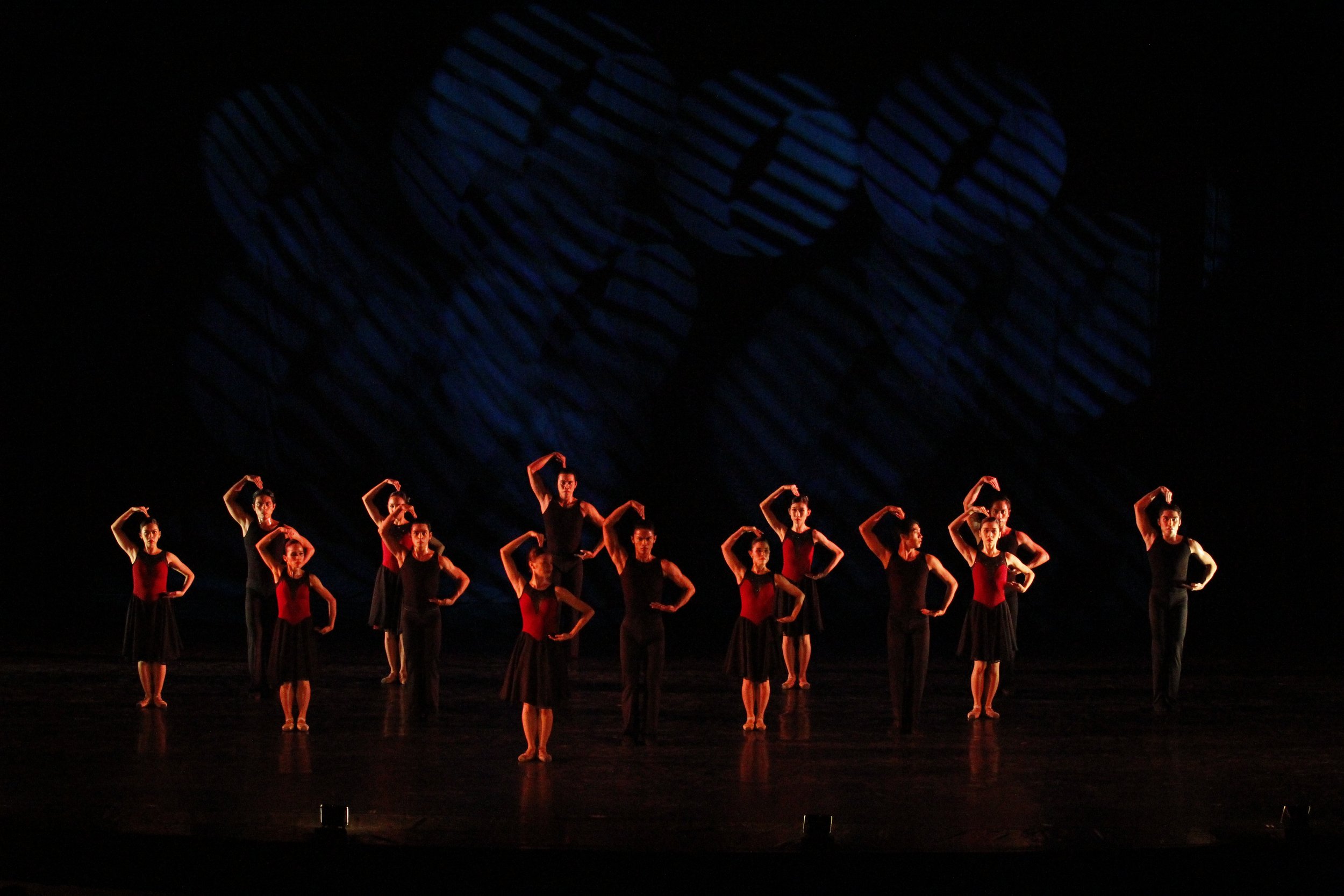   It's pure black for the men and black and maroon for the women as they simulate the movements of a clicking camera in Francis Jaena’s  Shutter . The choreography premiered in  Heart 2 Heart  in 2014. Photo by Ocs Alvarez   