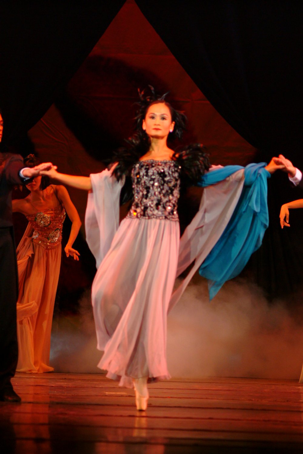    Lisa Macuja-Elizalde is the picture of style and sophistication as she goes on pointe in this gray gown with gray/silver and black embellishments on its bodice. The Tony Fabella-choreographed  Dalagang Pilipina,  featured in  OPM at OPB  (2003), a