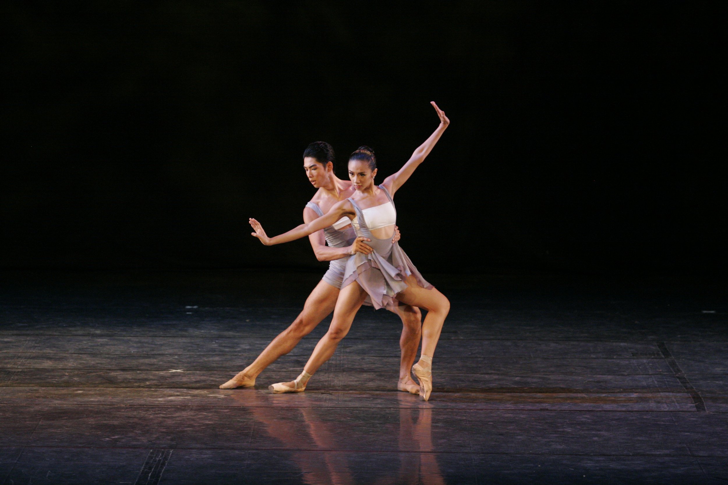    Beautiful angles and sleek lines characterize Augustus “Bam” Damian’s contemporary piece,  MAZN , performed in  Halo-Halo Extra Special  (2009). Nazer Salgado and Zaira Cosico – two of the four dancers whose initials form the title of the choreogr