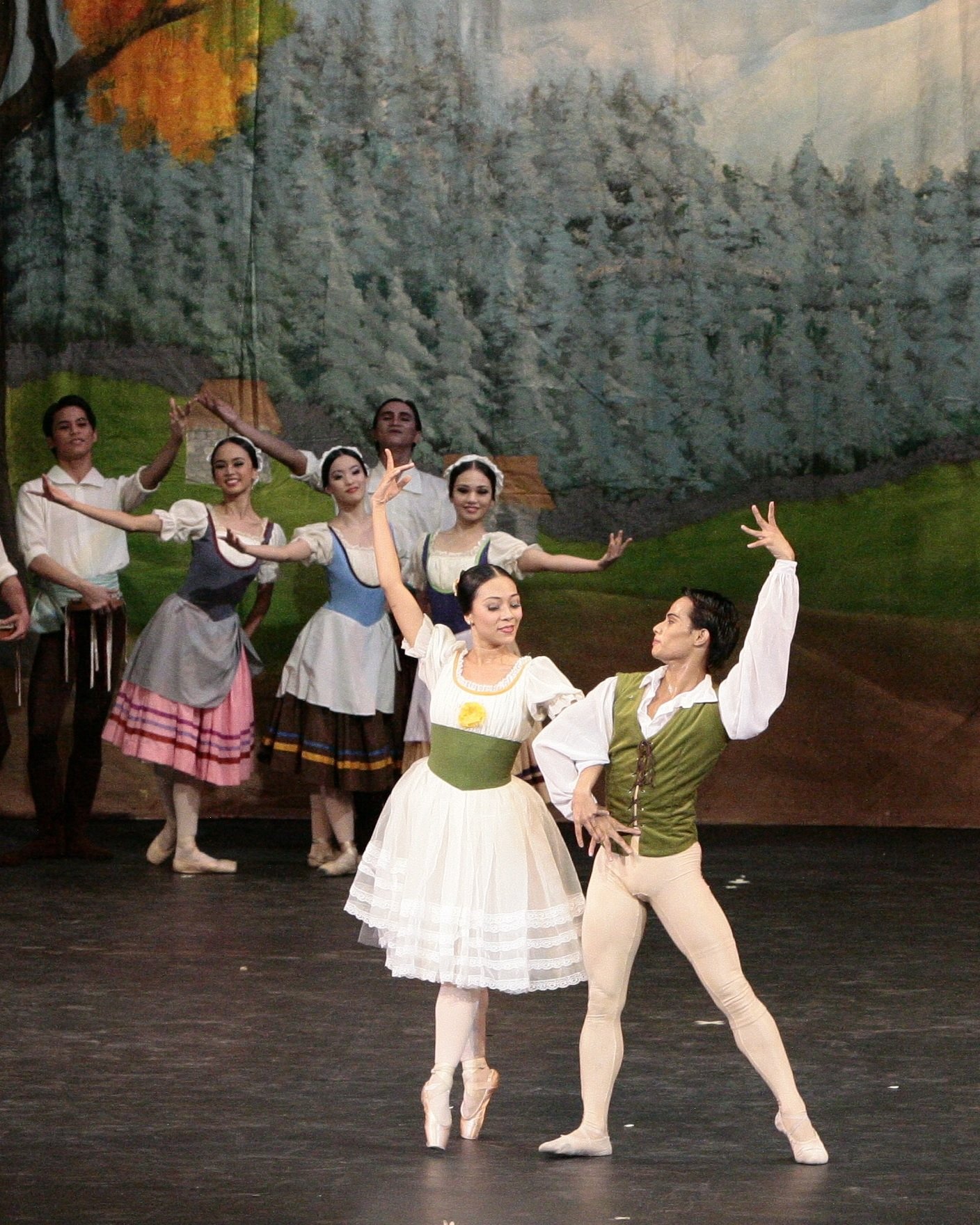    Dancing the Peasant Pas de Deux in  Giselle  (2010), Mylene Aggabao and Alvin Santos are in complete harmony as they also don costumes with complementing touches of olive green – in the thick waistband of her tutu and in his vest.   