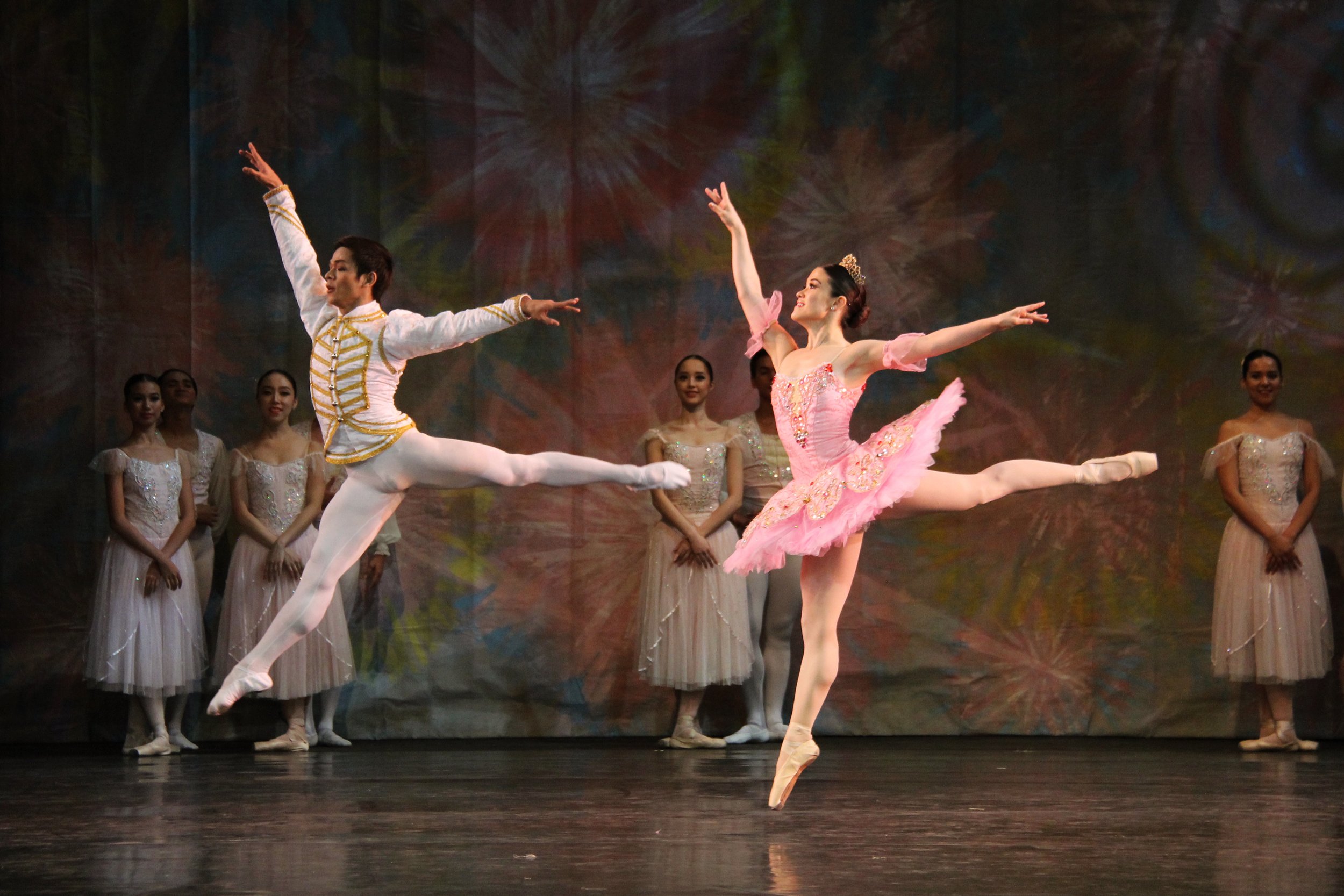    The Sugar Plum Fairy (Tiffany Chiang-Janolo) and her Prince (Gerardo Francisco Jr.) act as the hosts of Masha and the Nutcracker as the pair is magically transported to the Land of Sweets after having defeated the Mouse King. As a reward, they are