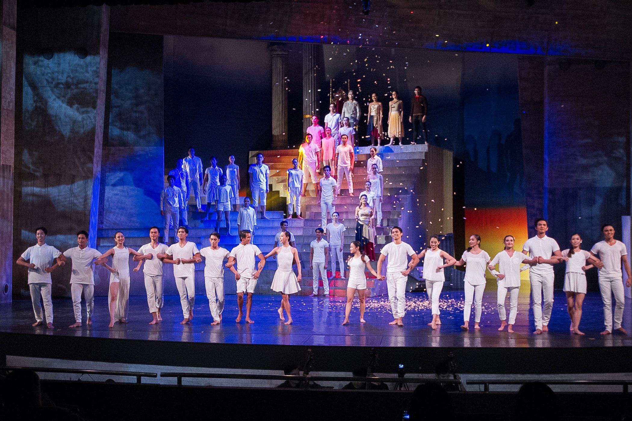    Symbolizing the triumph of good versus evil, the dancers in Martin Lawrance’s  Rebel  (2016) are clad in a variety of white ensembles. It is a celebratory scene where, after the people come together and link arms in a gesture known as “ kapit-bisi