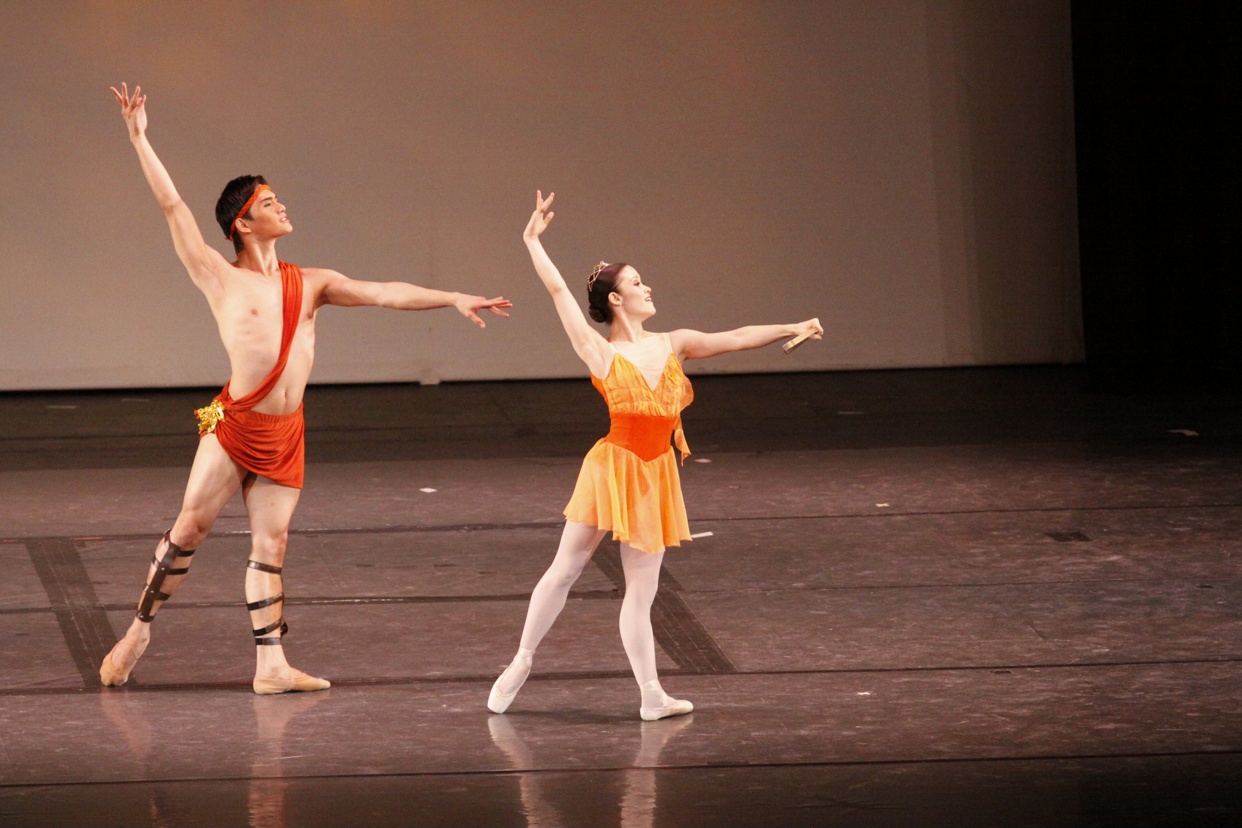    The relationship between Acteon (Alfren Salgado) and Diane (Tiffany Chiang-Janolo) is heightened, thanks to their complementing costumes in shades of orange.  Diane and Acteon , a popular pas de deux from the ballet  Esmeralda  about the goddess f