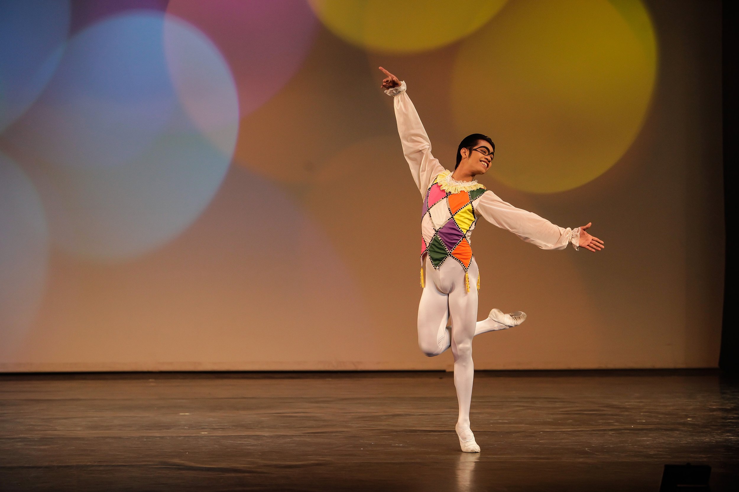    With his easy grin and mischievous ways, the harlequin (Anselmo Dictado) gets attention, specially from his partner, in the  Harlequinade  pas de deux. In the 2014 production  Heart to Heart: Ballet &amp; Ballads , three couples alternated in the 