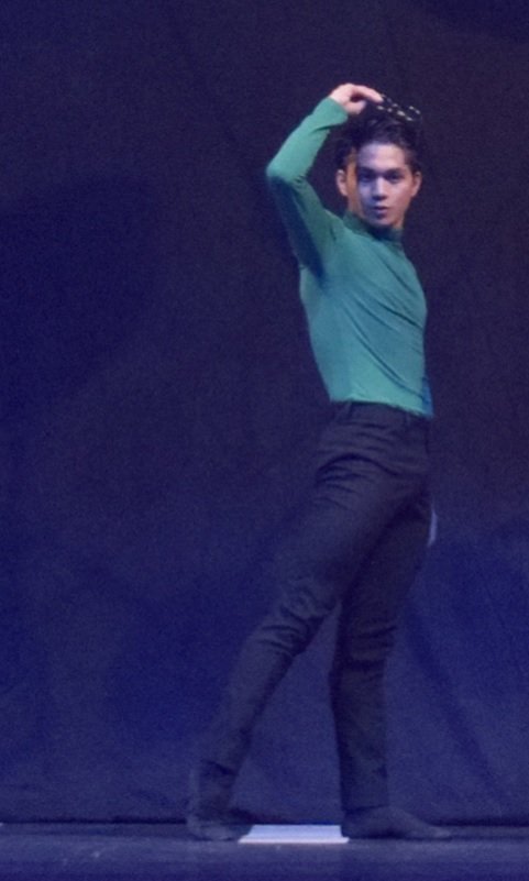    Jamil Montibon is grooviness personified in a green turtleneck top and form-fitting black pants inspired by ‘60s fashion, perfect to dance Martin Lawrance’s  The Winding Road  in as it uses Beatles music. The choreography, which features other dan