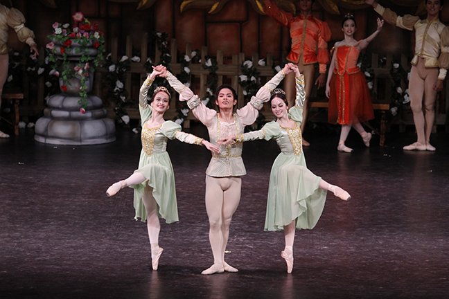    The Pas de Trois in Act 1 of  Swan Lake  (2011) features dancers (from left) Yanti Marduli, Elpidio Magat Jr. and Jennifer Olayvar wearing attires in a soft shade of green as they prance at Prince Siegfried’s twenty-first birthday fete. Photo by O