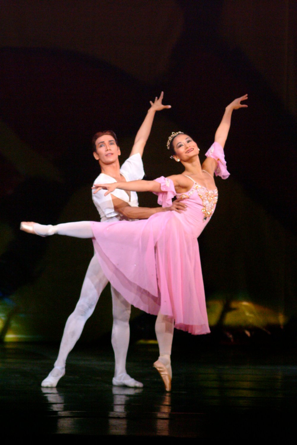    As the lead ballerina in Tony Fabella’s  Dancing to Verdi , Lisa Macuja-Elizalde is a vision in pink, as partnered by Osias Barroso. The neoclassical piece was part of  OPM at OPB  in 2003, showcasing Original Pilipino Music and Original Pilipino 