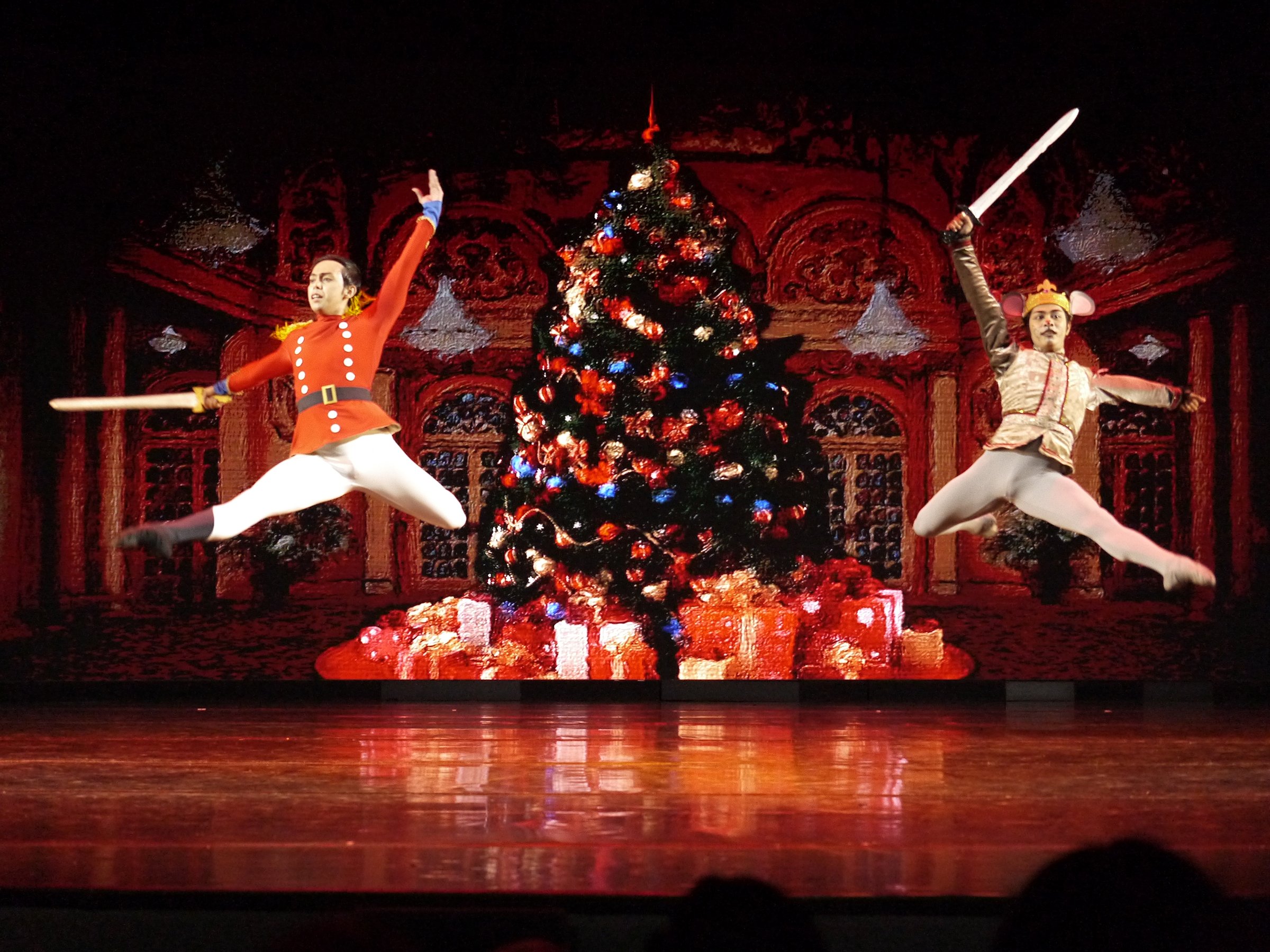    The Nutcracker Prince (Sean Pelegrin) and the Mouse King (Anselmo Dictado) battle it out in one of the ballet’s iconic scenes.   