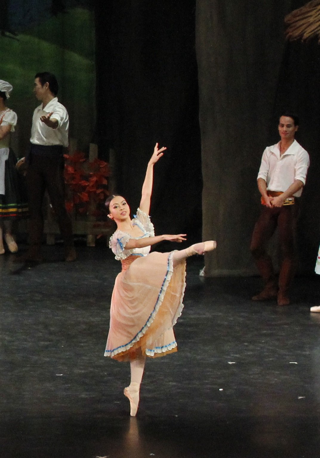    Everything’s peachy, literally, when Sofia Sangco-Peralta joins the community in a festive gathering in  Giselle  (2012). She and her friends opt for pastel colors, and hers just happens to be peach. Photo by Ocs Alvarez   