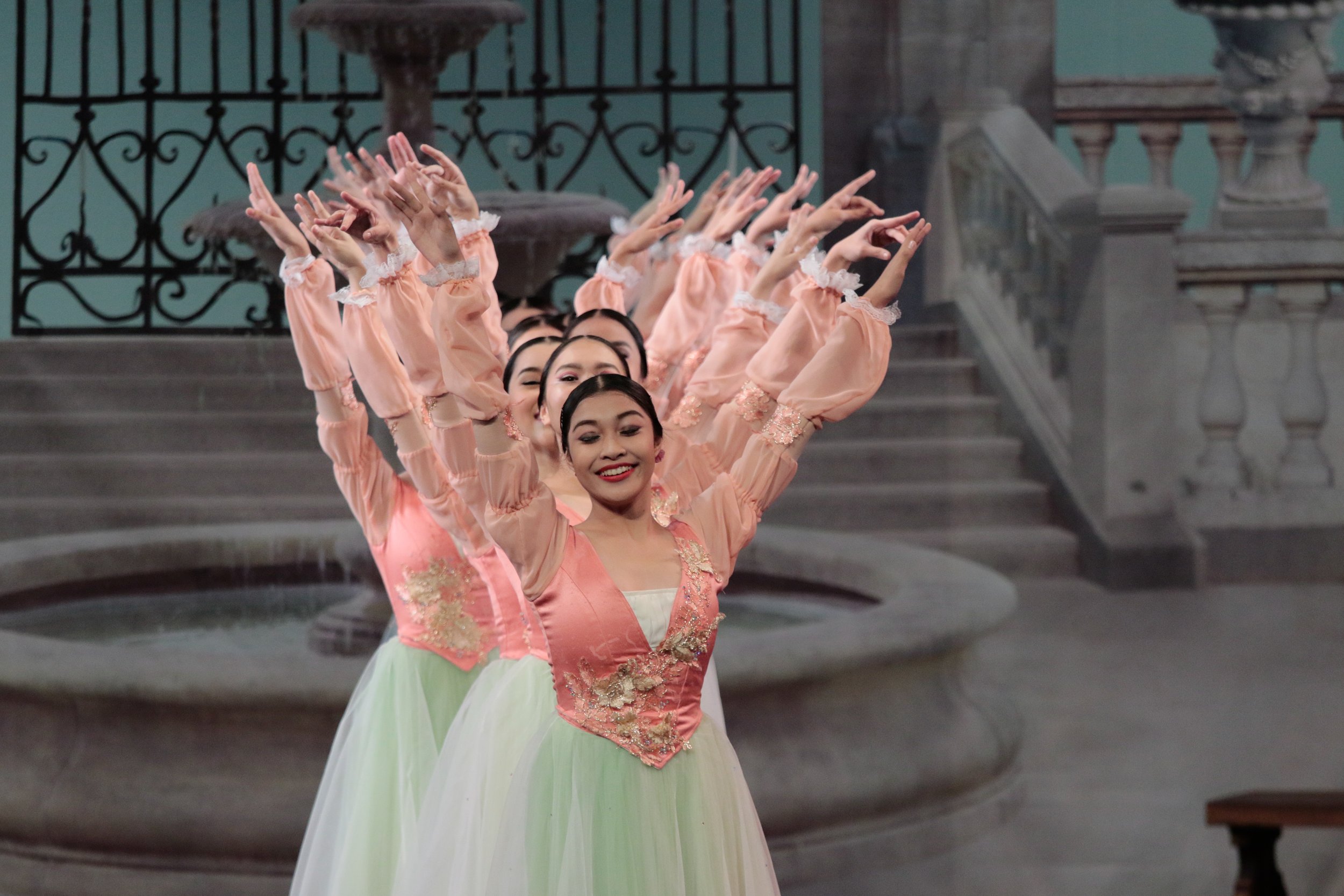    Dancing in the palace grounds in tutus of peach and mint green, these court ladies in  Swan Lake  (2017) savor performing at the coming-of-age celebration for Prince Siegfried. Photo by Ocs Alvarez   