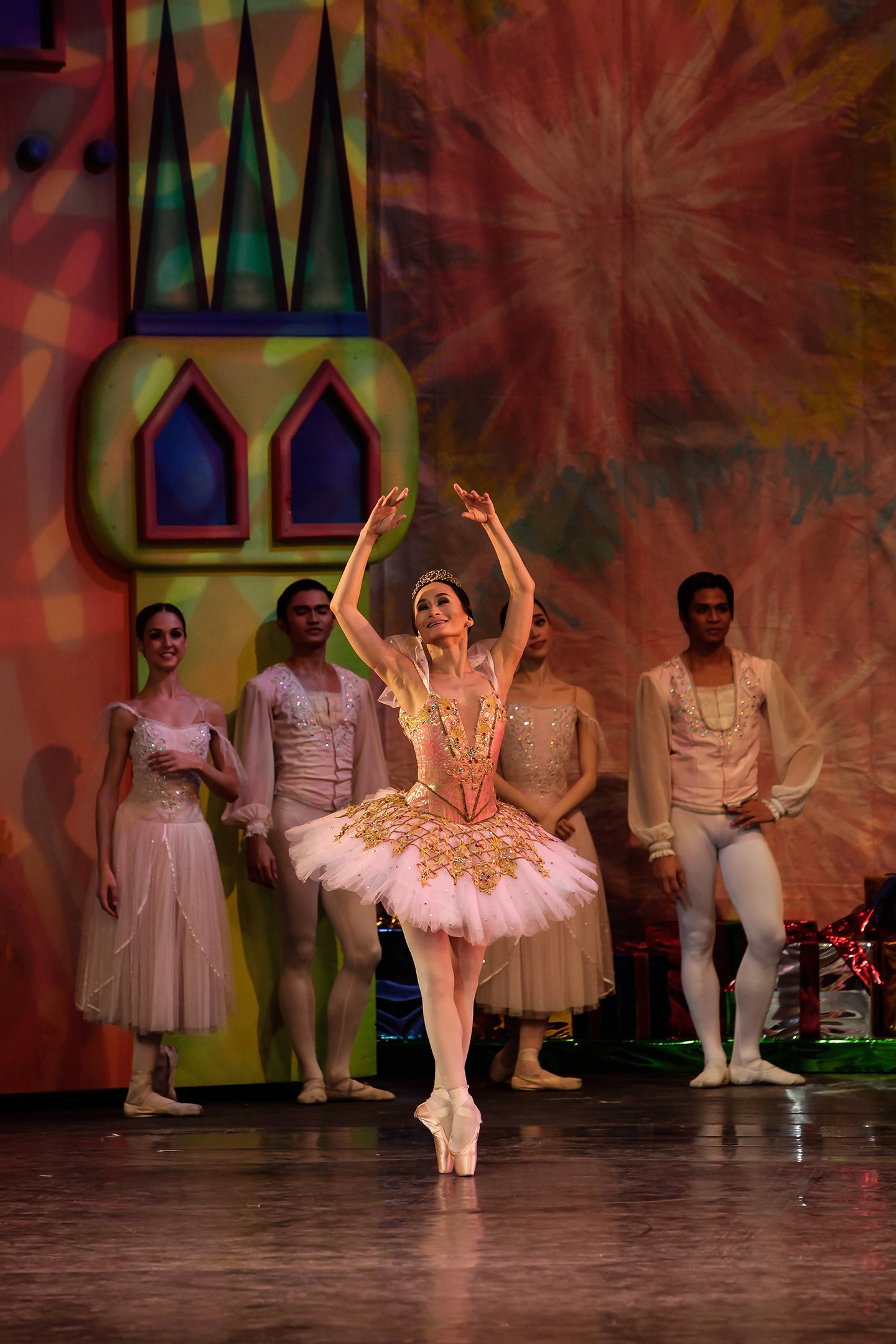    The Sugar Plum Fairy (Lisa Macuja Elizalde) in  The Nutcracker  (2013) is pretty in pink! Gold accents and colored gems adorn the baby pink tulle skirt and the blush pink bodice, proving to be a dazzler in this favorite Christmas ballet. Photo by 