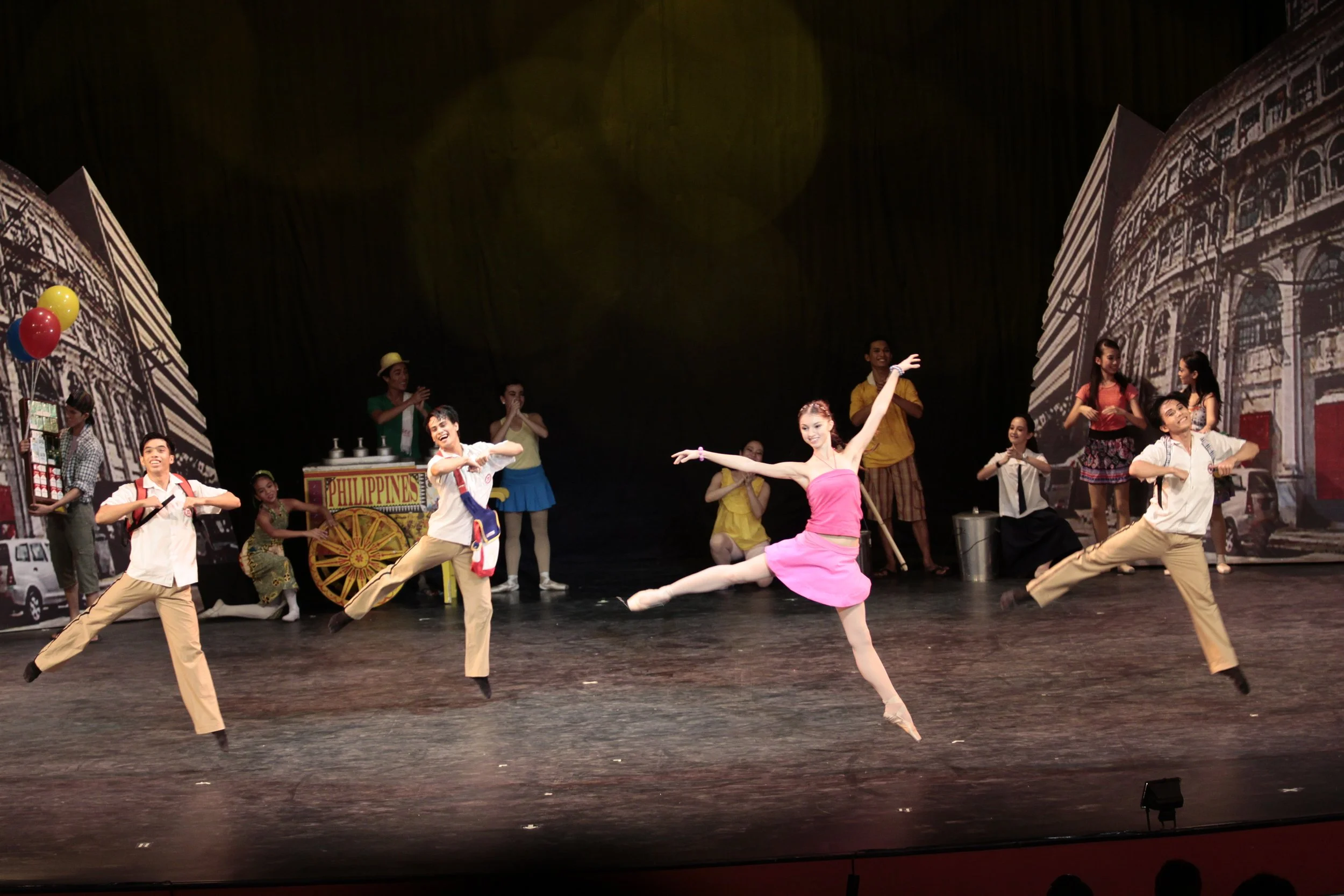    Elena Chernova is eye-catching in pink as she matches moves with (from left) Kenneth del Rosario, Alvin Santos and Roduardo Ma for an interpretation of the playful ditty  Da Coconut Nut . It is just one of the scenes making up the urban-set  Mayni