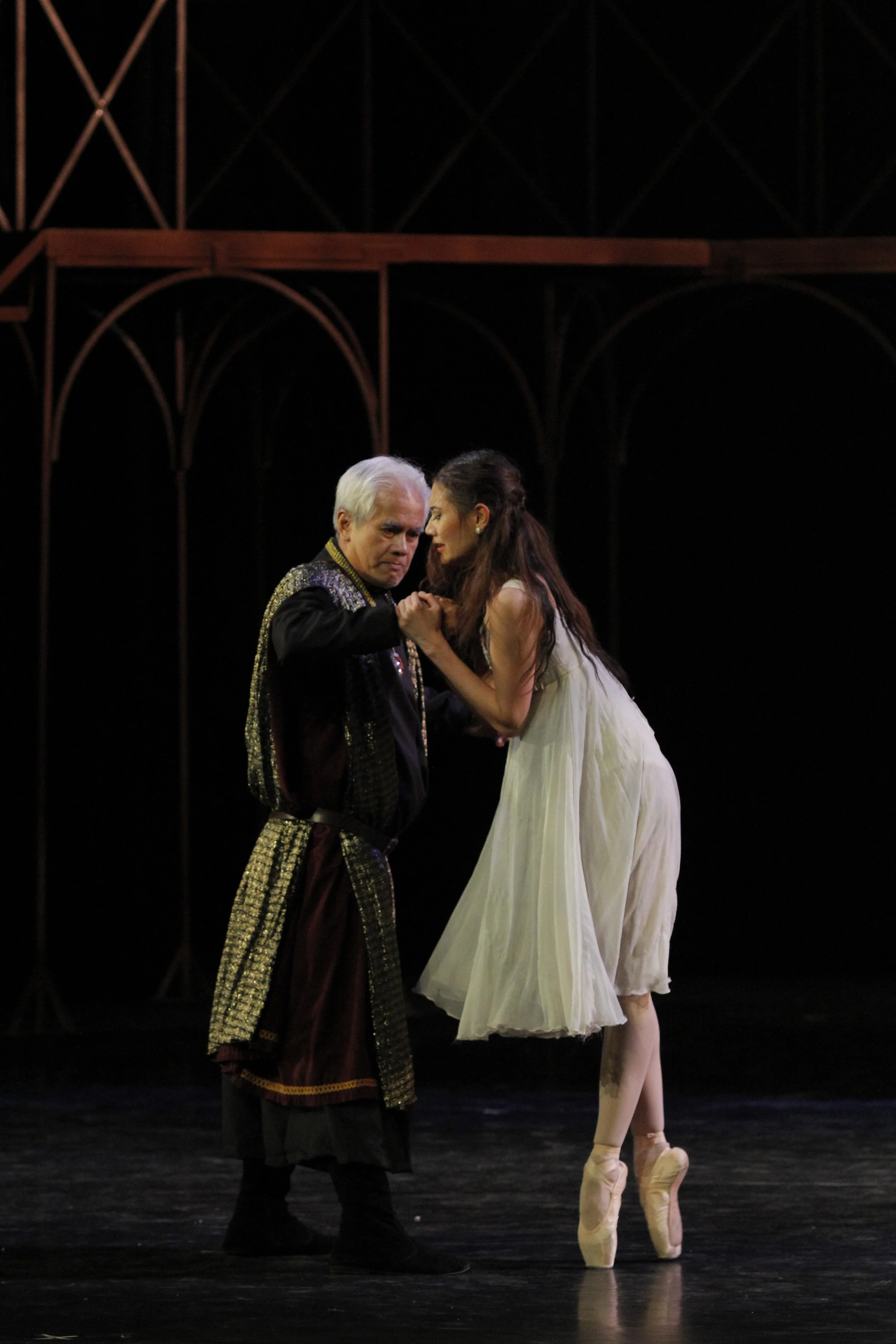    Juliet (Abigail Oliveiro) begs her father, Lord Capulet (Nonoy Froilan), not to force her to marry Paris, his choice for her as a partner, after having already fallen for Romeo. True to the Shakespearean tale, the father remains adamant in Paul Va