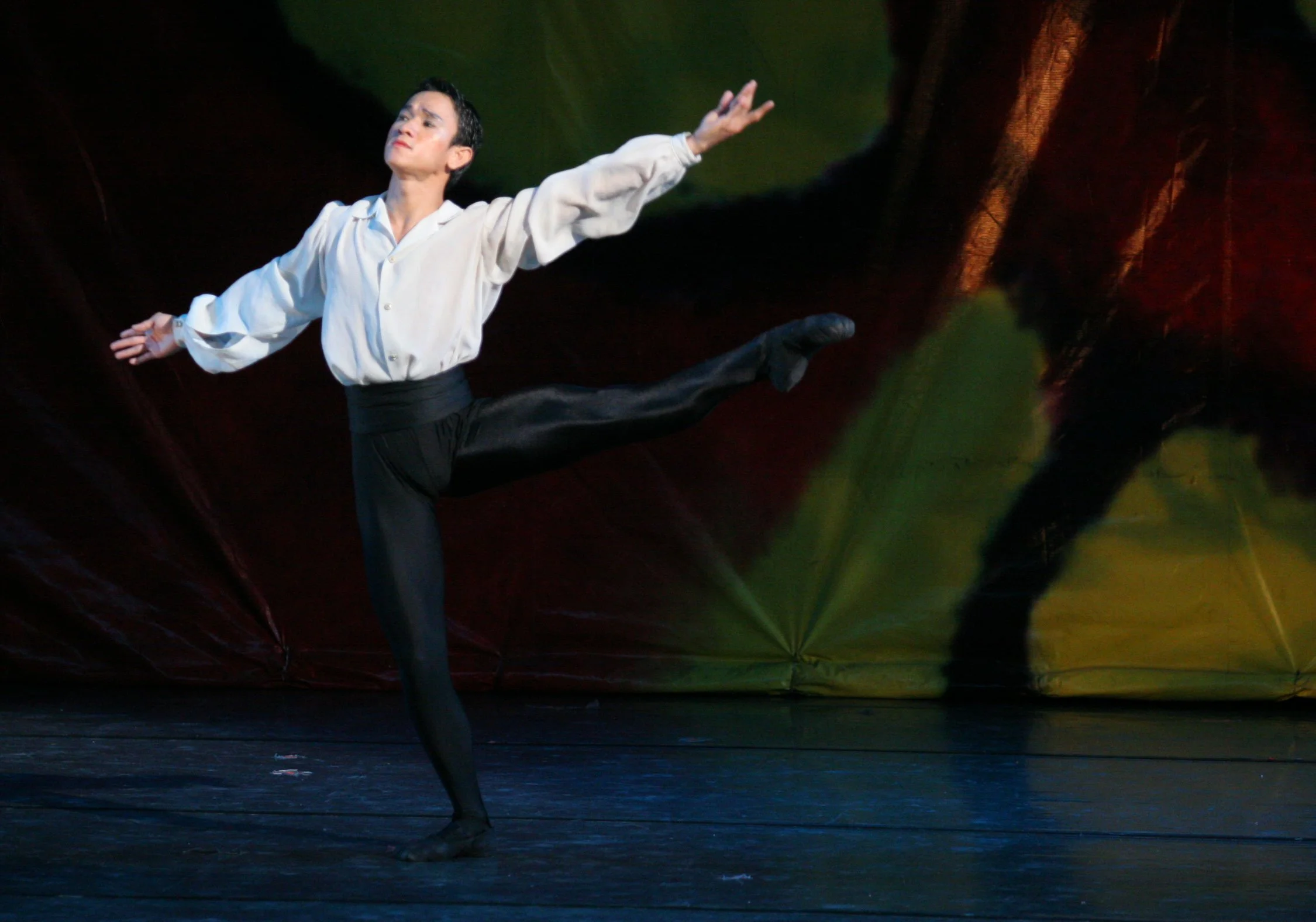    Jerome Espejo is elegance personified in his black and white ensemble, dancing as half of the pair in the romantic  Sana Maulit Muli.  Playing on the themes of love and longing, the pas de deux was performed in  BM Goes International  in 2005. Pho