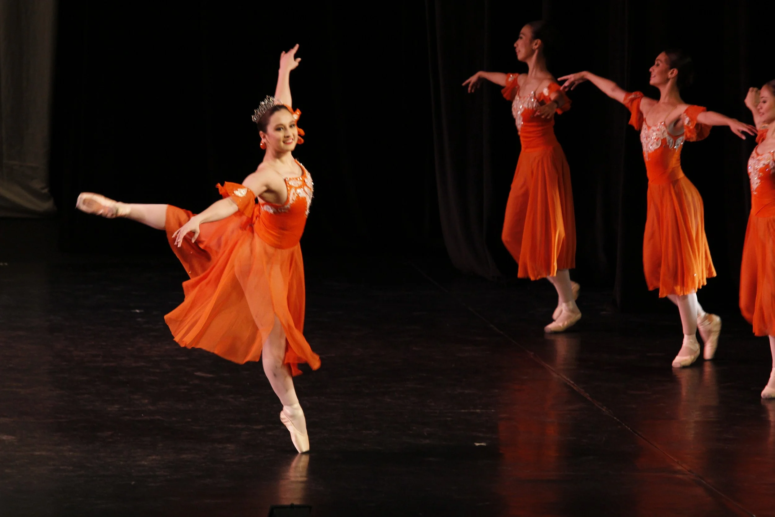    Ballerinas in eye-catching orange led by Missy Elizalde form part of the cast of  Dancing to Verdi.  Choreographed by Tony Fabella as a gift for Ballet Manila and a tribute to the strength and stamina of its dancers, the rigorous neoclassical piec